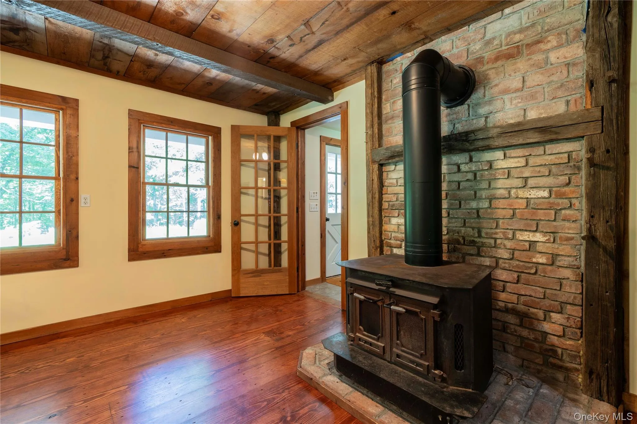 Enter Home to Dining Area with Cast-Iron Wood Stove Enter Home to Dining Area with Cast-Iron Wood Stove