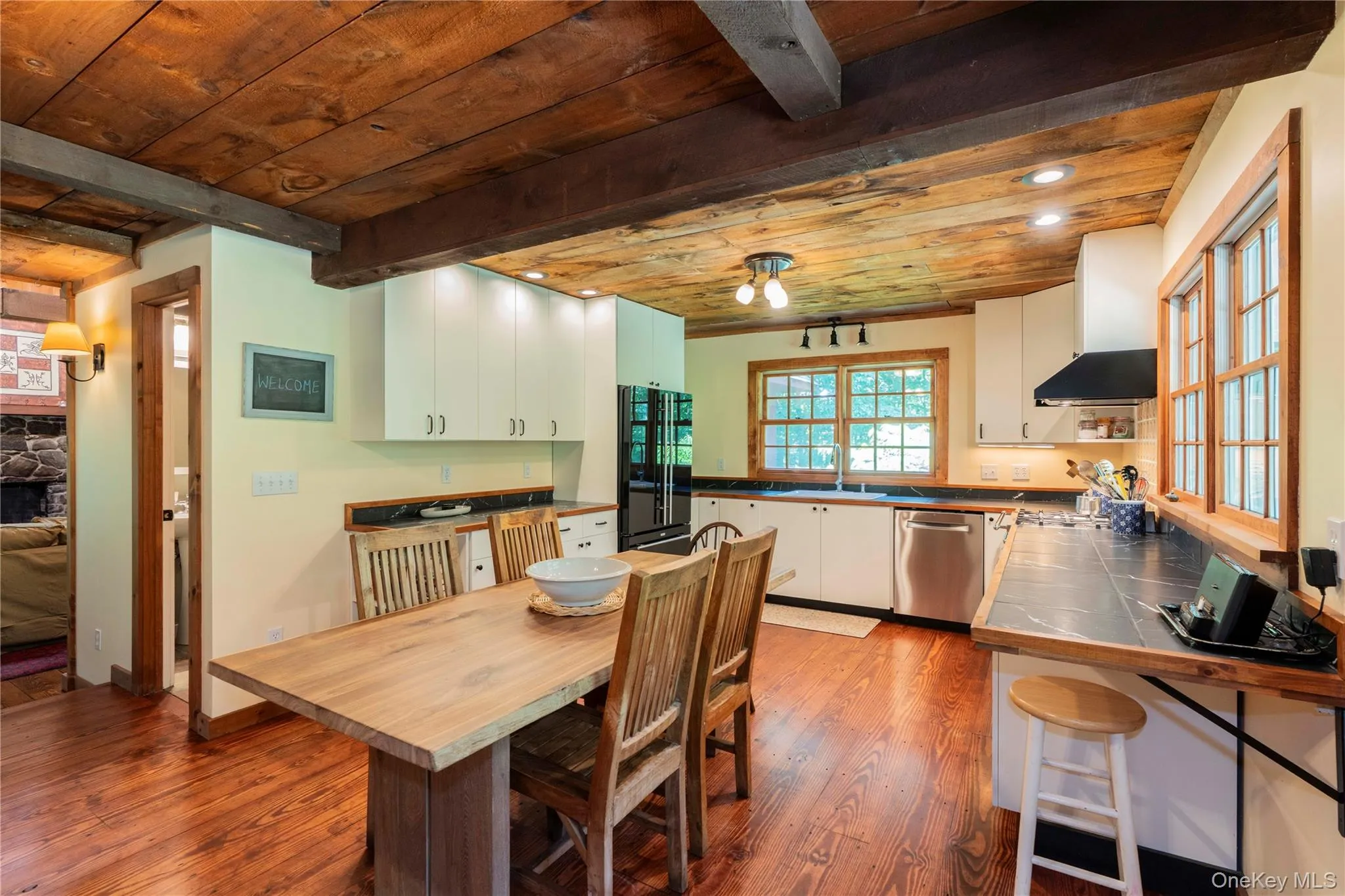Open Dining Area to Country Kitchen with Beamed Wood Ceiling Open Dining Area to Country Kitchen with Beamed Wood Ceiling