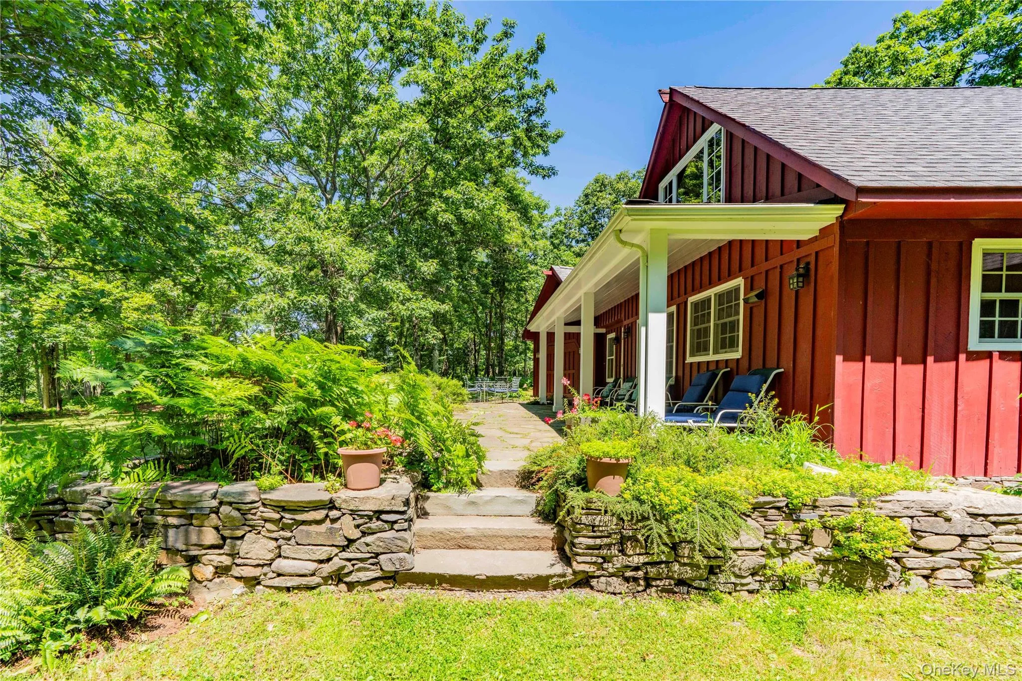 Stone Stairs to Home Entrance with Stone Walls & Gardens Stone Stairs to Home Entrance with Stone Walls & Gardens