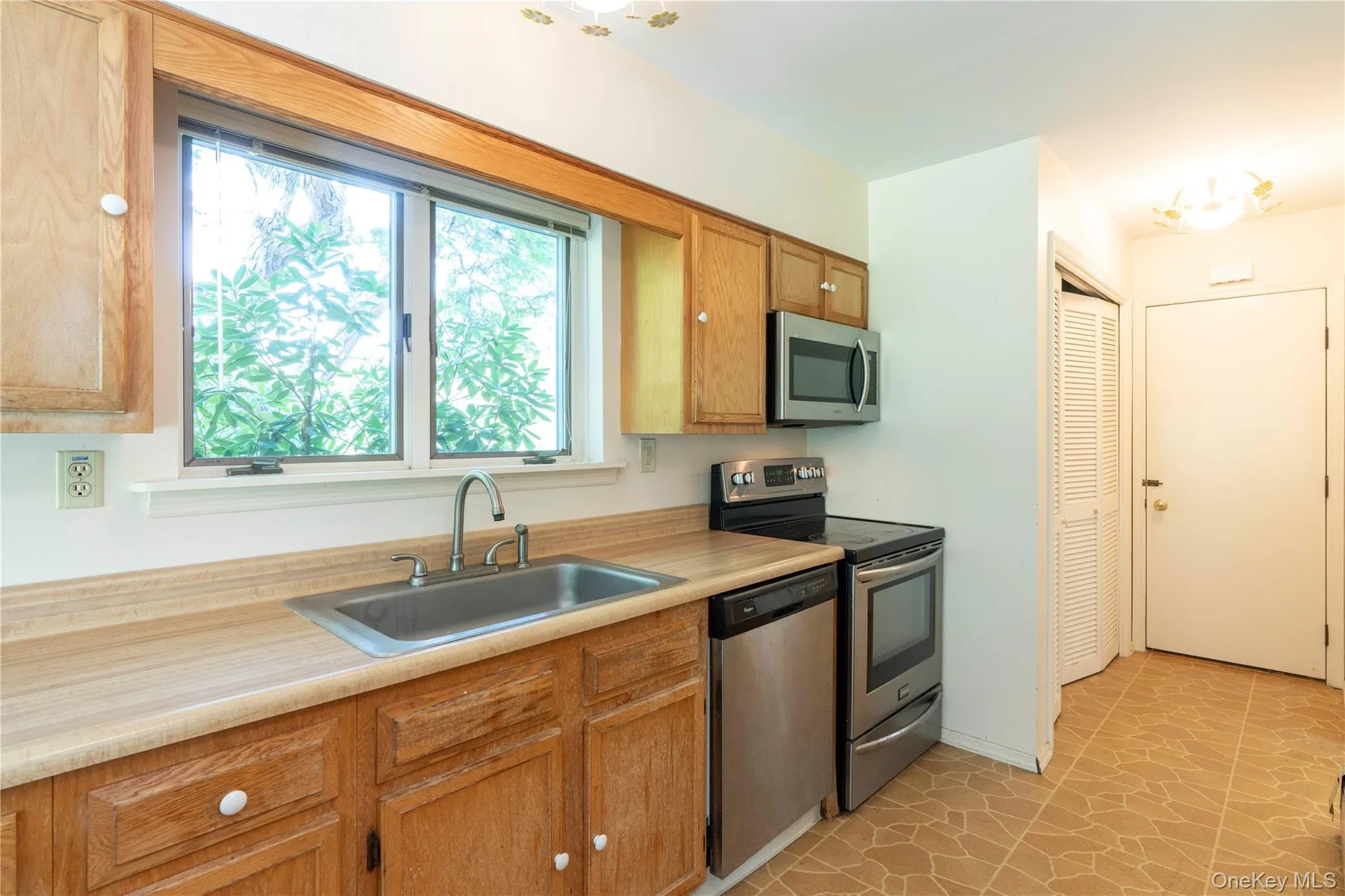 Kitchen Leads to Garage & Laundry Area Kitchen Leads to Garage & Laundry Area