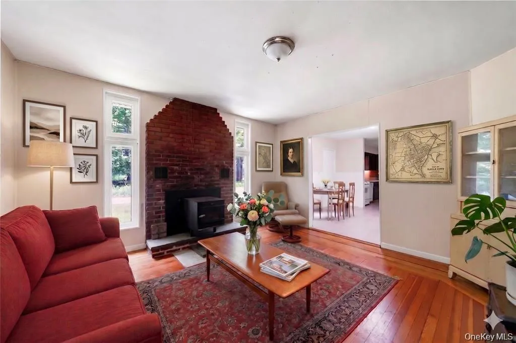 Virtually Staged: A comfortable living room offering a functional space for everyday relaxing, gathering, or entertaining. Virtually Staged: A comfortable living room offering a functional space for everyday relaxing, gathering, or entertaining.