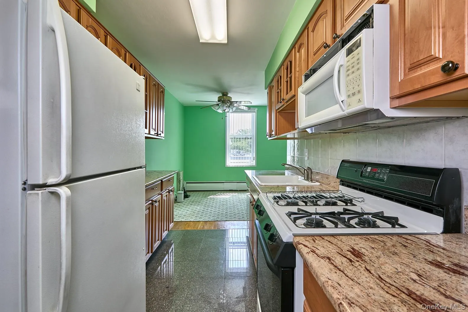 Kitchen/opens to dining area Kitchen/opens to dining area