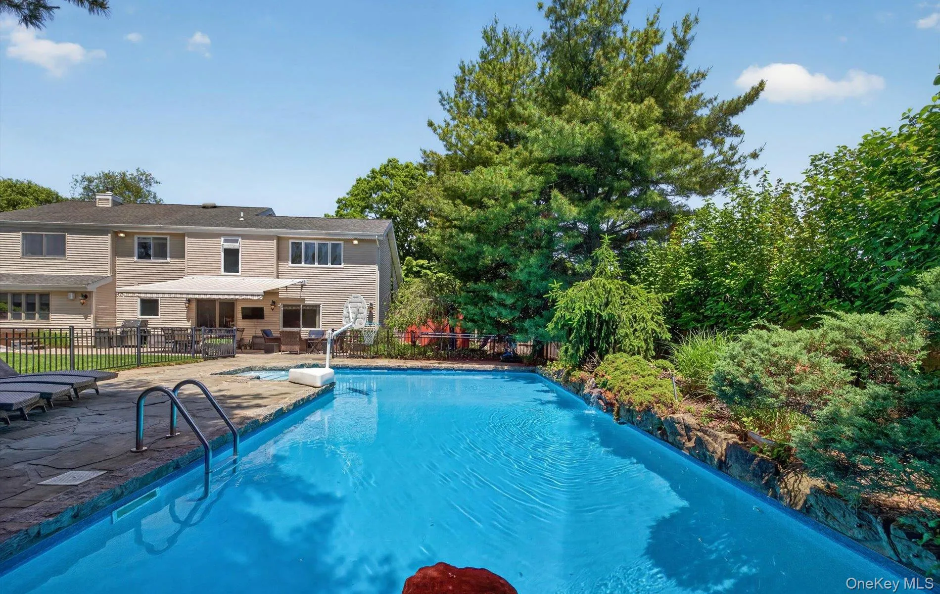Fenced Pool Waterfall SaltwaterHeated -Gas Heat Fenced Pool Waterfall SaltwaterHeated -Gas Heat
