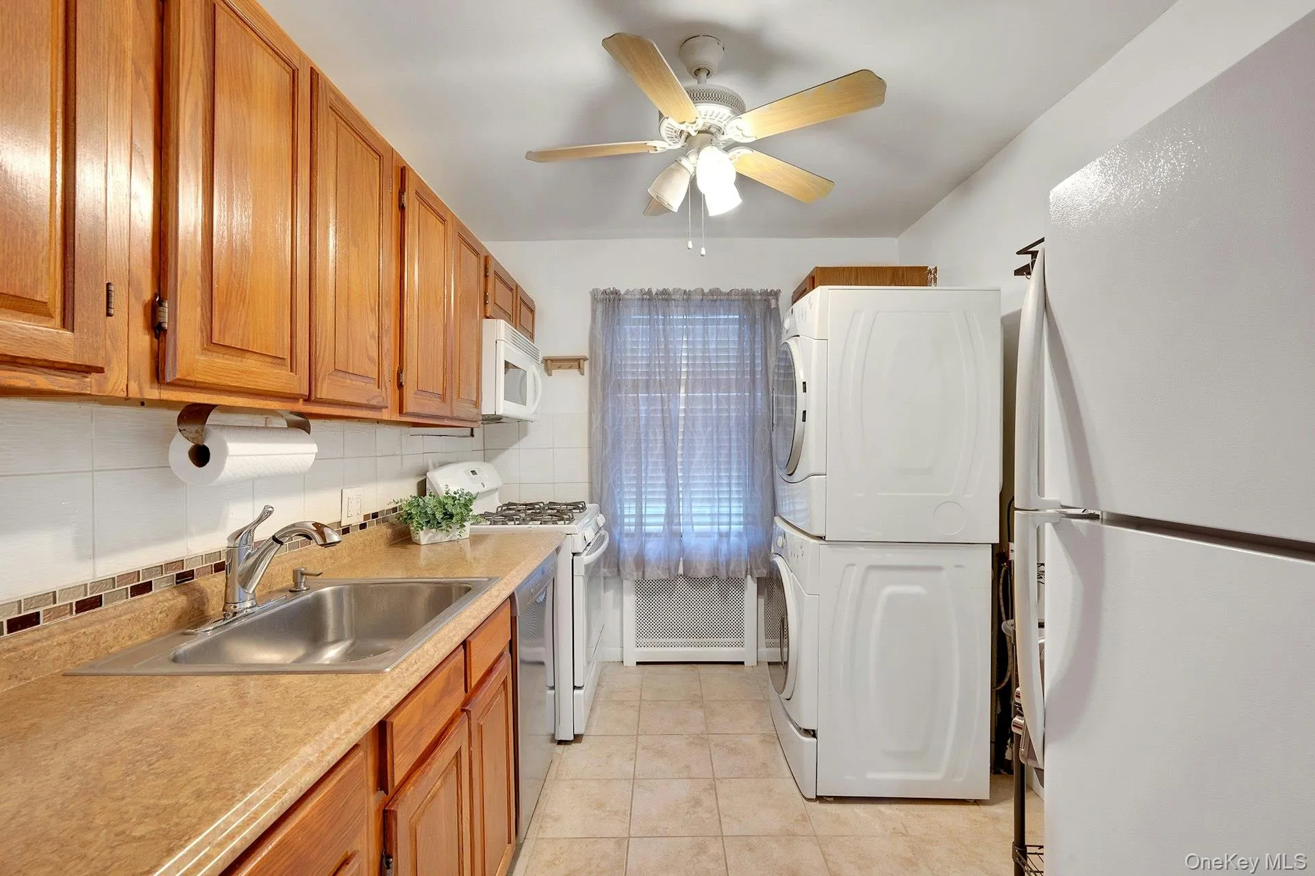 Kitchen with in-unit laundry Kitchen with in-unit laundry