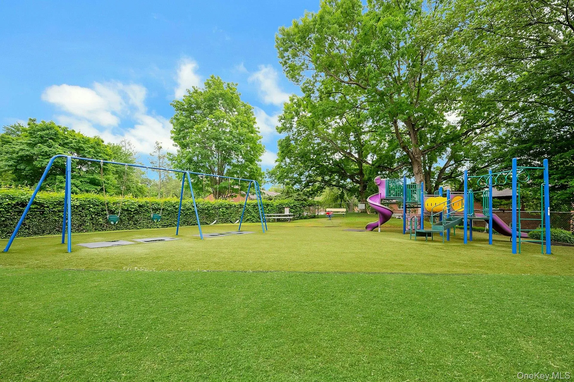The playground is located next to the pool The playground is located next to the pool