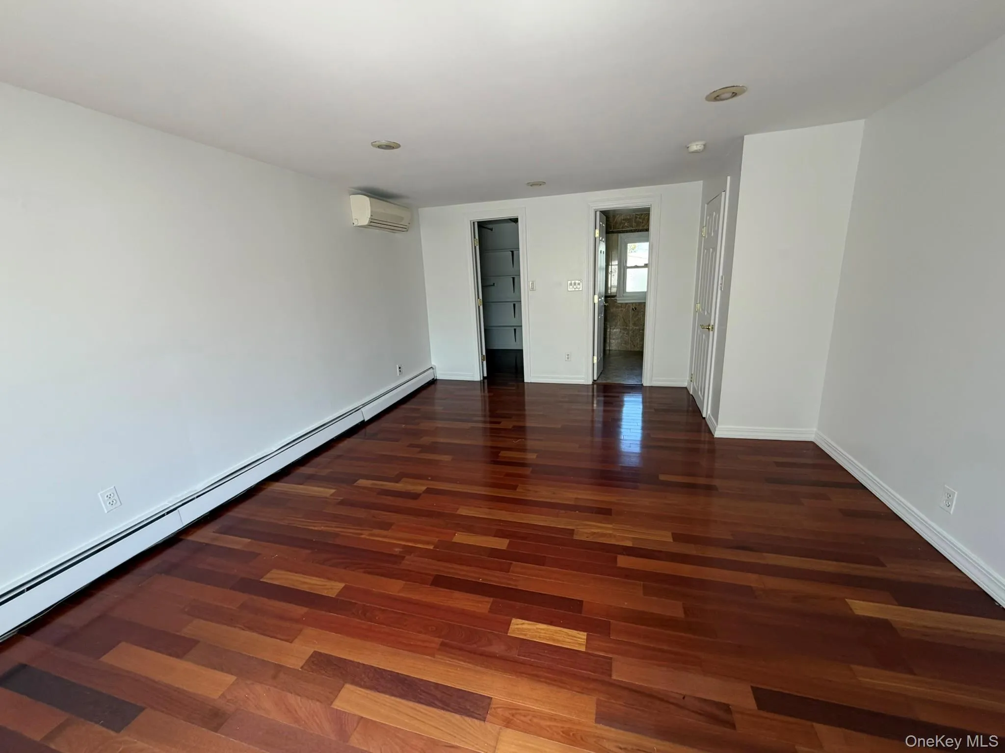 Primary Bedroom W/1/2 Bath & walk in Closet Primary Bedroom W/1/2 Bath & walk in Closet