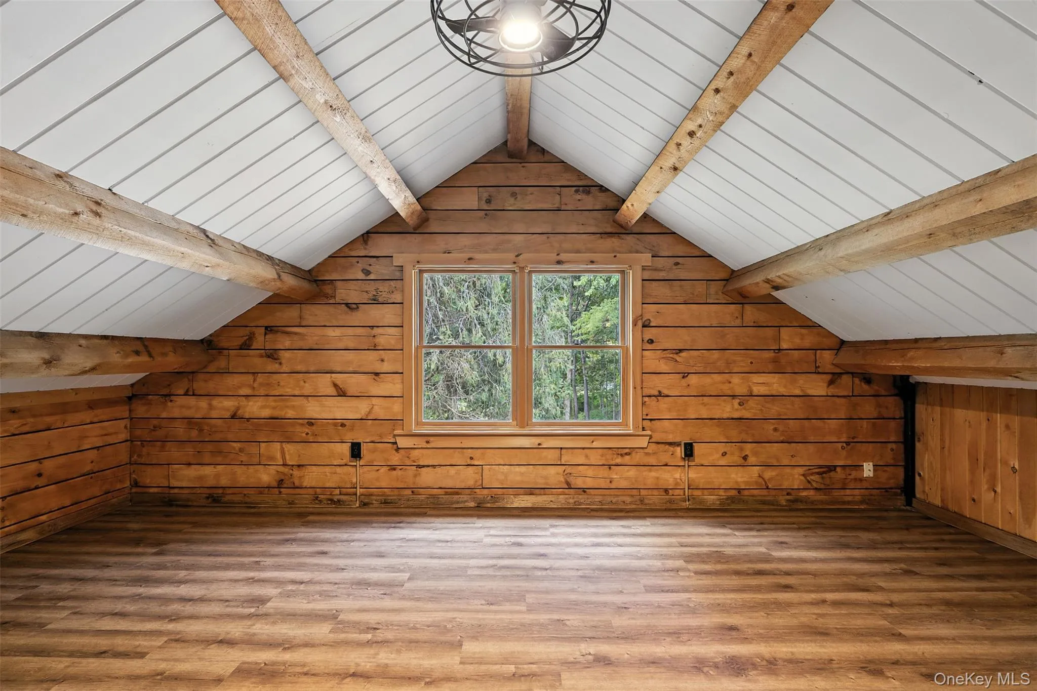 Bonus room featuring wood walls, wood finished floors, and wooden ceiling Bonus room featuring wood walls, wood finished floors, and wooden ceiling