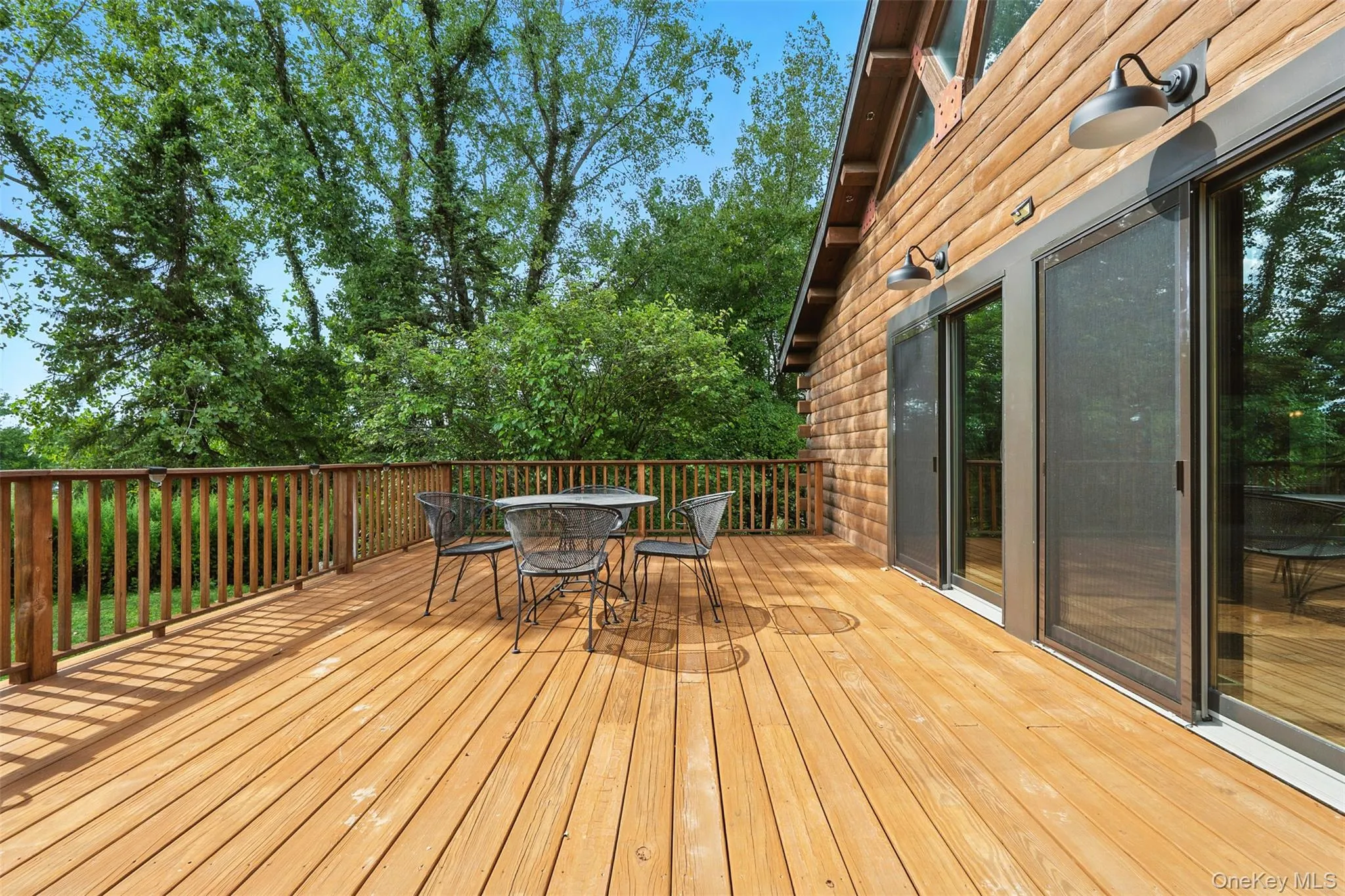 Wooden deck with outdoor dining area Wooden deck with outdoor dining area