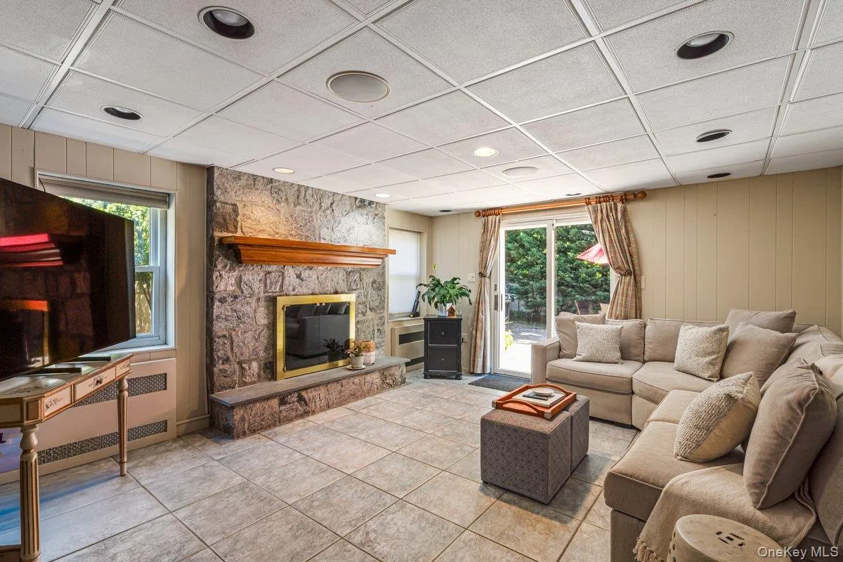 Den with Fireplace & Sliders to Patio Den with Fireplace & Sliders to Patio