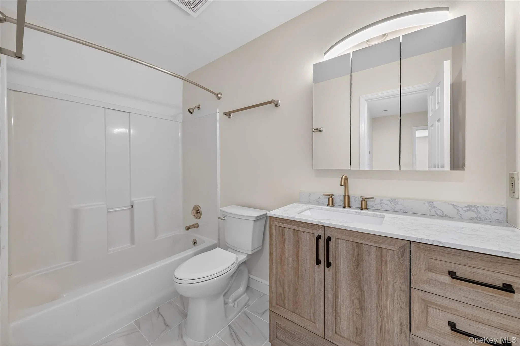 Bathroom with shower / washtub combination and vanity Bathroom with shower / washtub combination and vanity