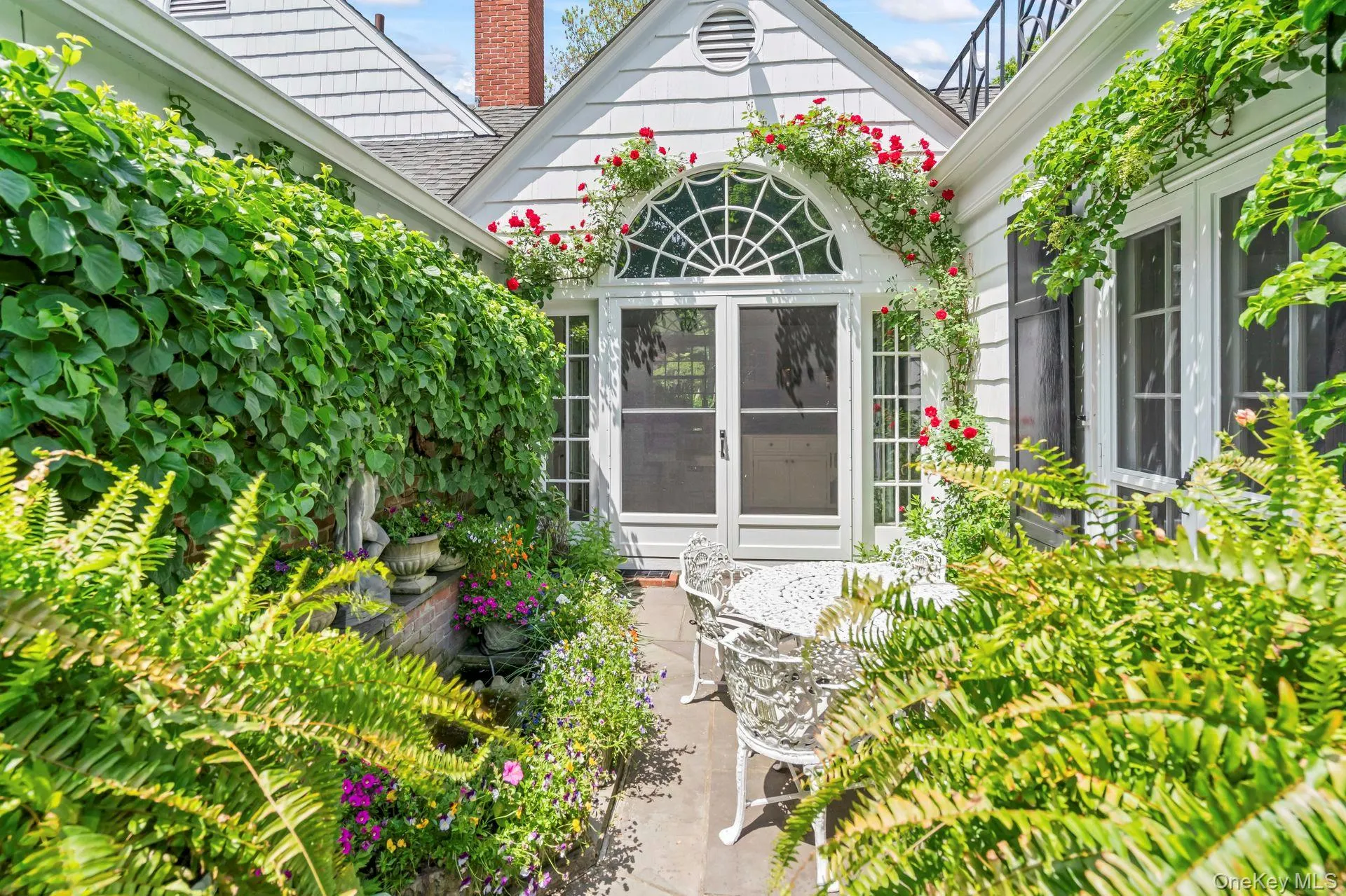 Private gardens/sitting area located outside of kitchen Private gardens/sitting area located outside of kitchen