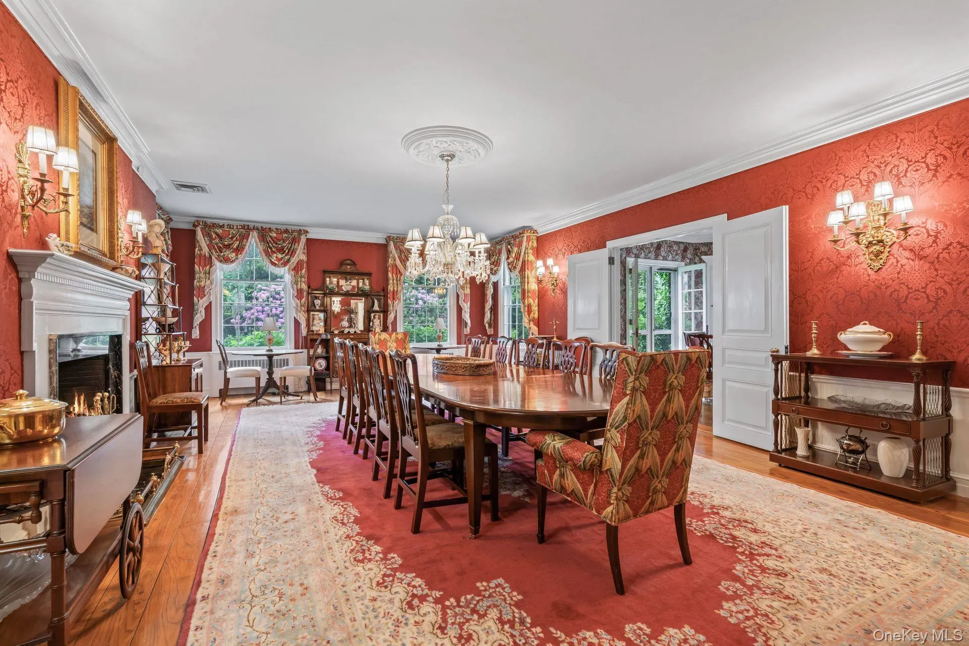 Banquet sized formal dining room with wood burning fireplace Banquet sized formal dining room with wood burning fireplace