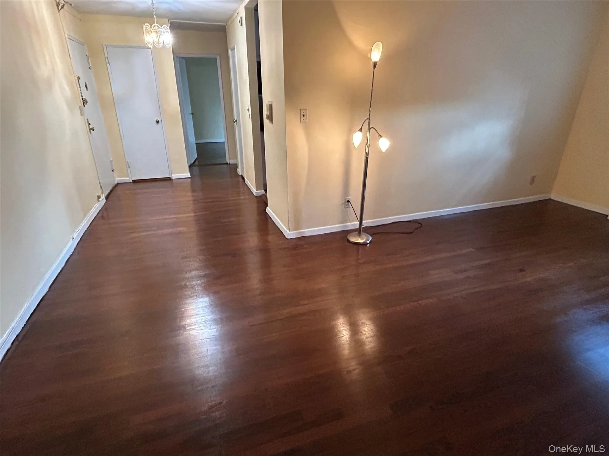 Dining area on left with enough room for a table that seats 8, living room on right Dining area on left with enough room for a table that seats 8, living room on right