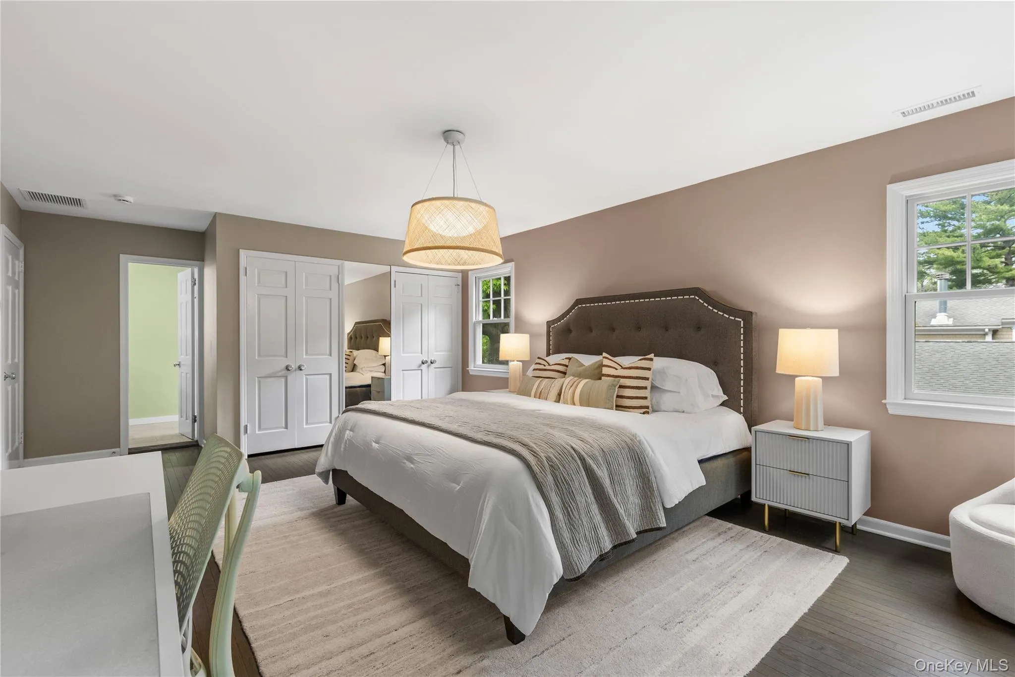 Two large closets have been outfitted to offer abundant storage. Two large closets have been outfitted to offer abundant storage.