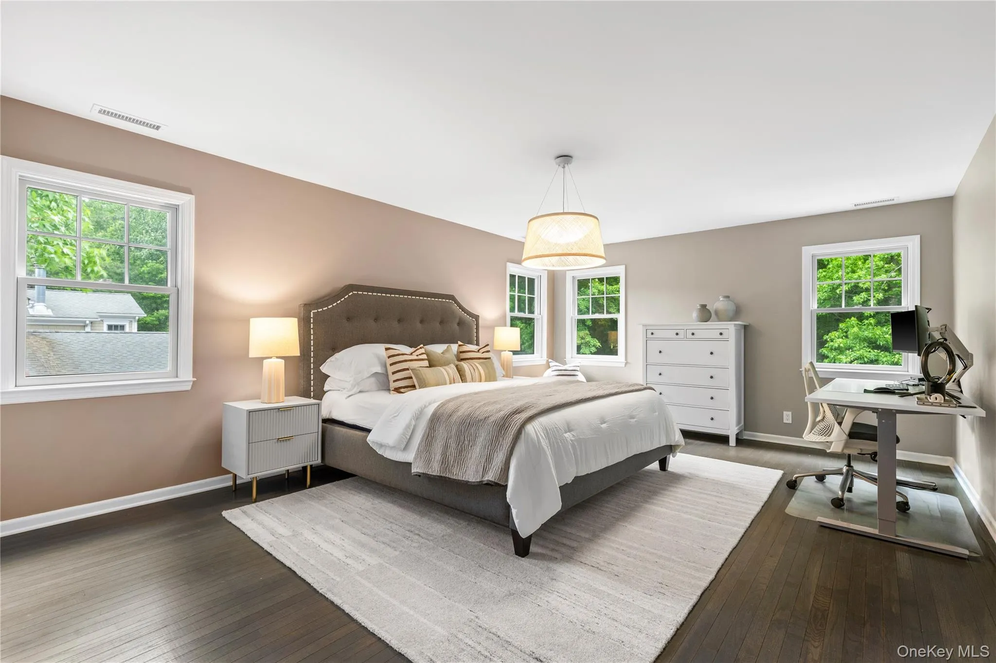 The primary bedroom is spacious and can accomodate various furniture configurations. The primary bedroom is spacious and can accomodate various furniture configurations.