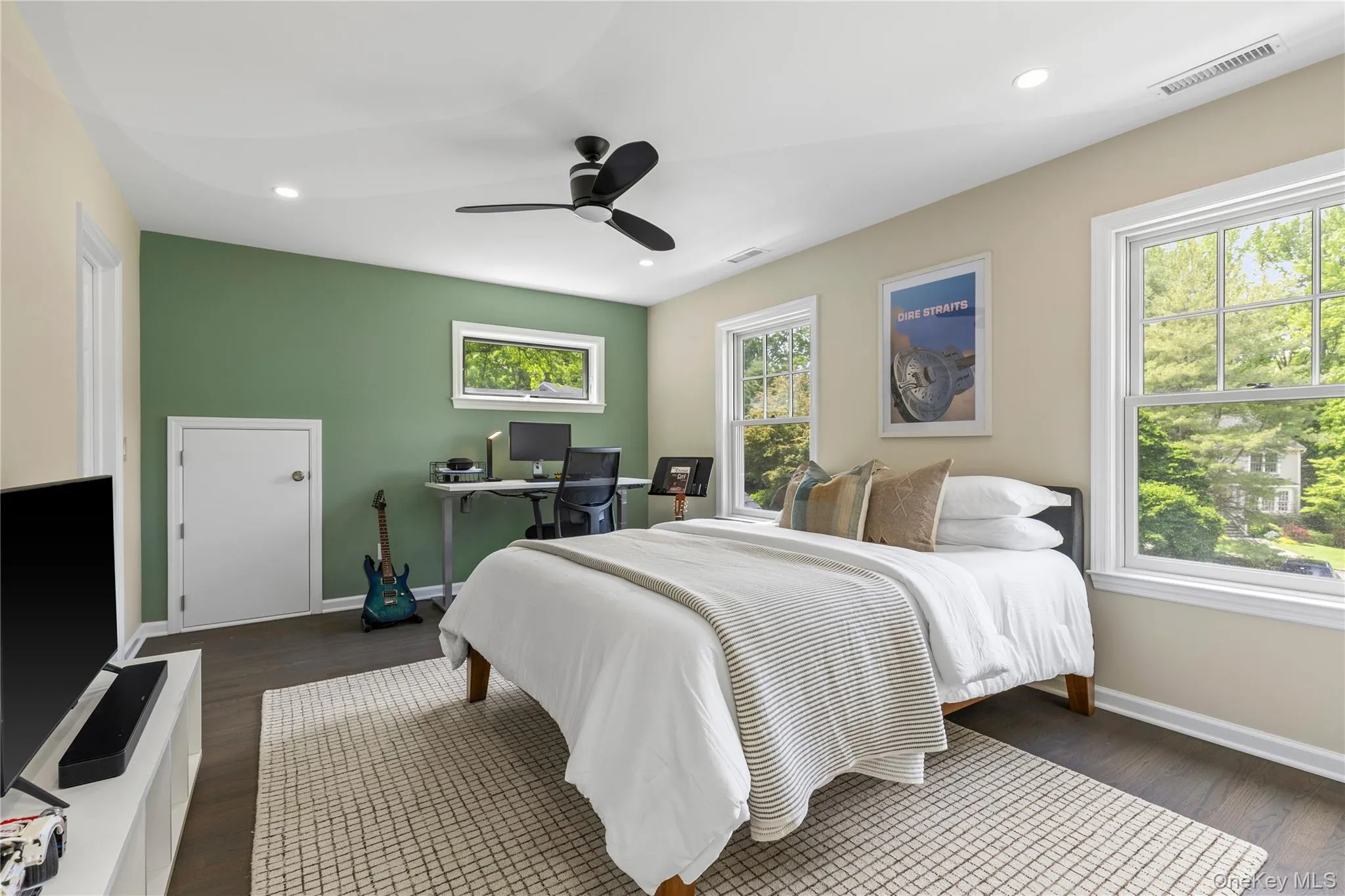 This bright bedroom faces the cul-de-sac, has access to a Jack & Jill bathroom and to a fully insulated attic storage space. This bright bedroom faces the cul-de-sac, has access to a Jack & Jill bathroom and to a fully insulated attic storage space.
