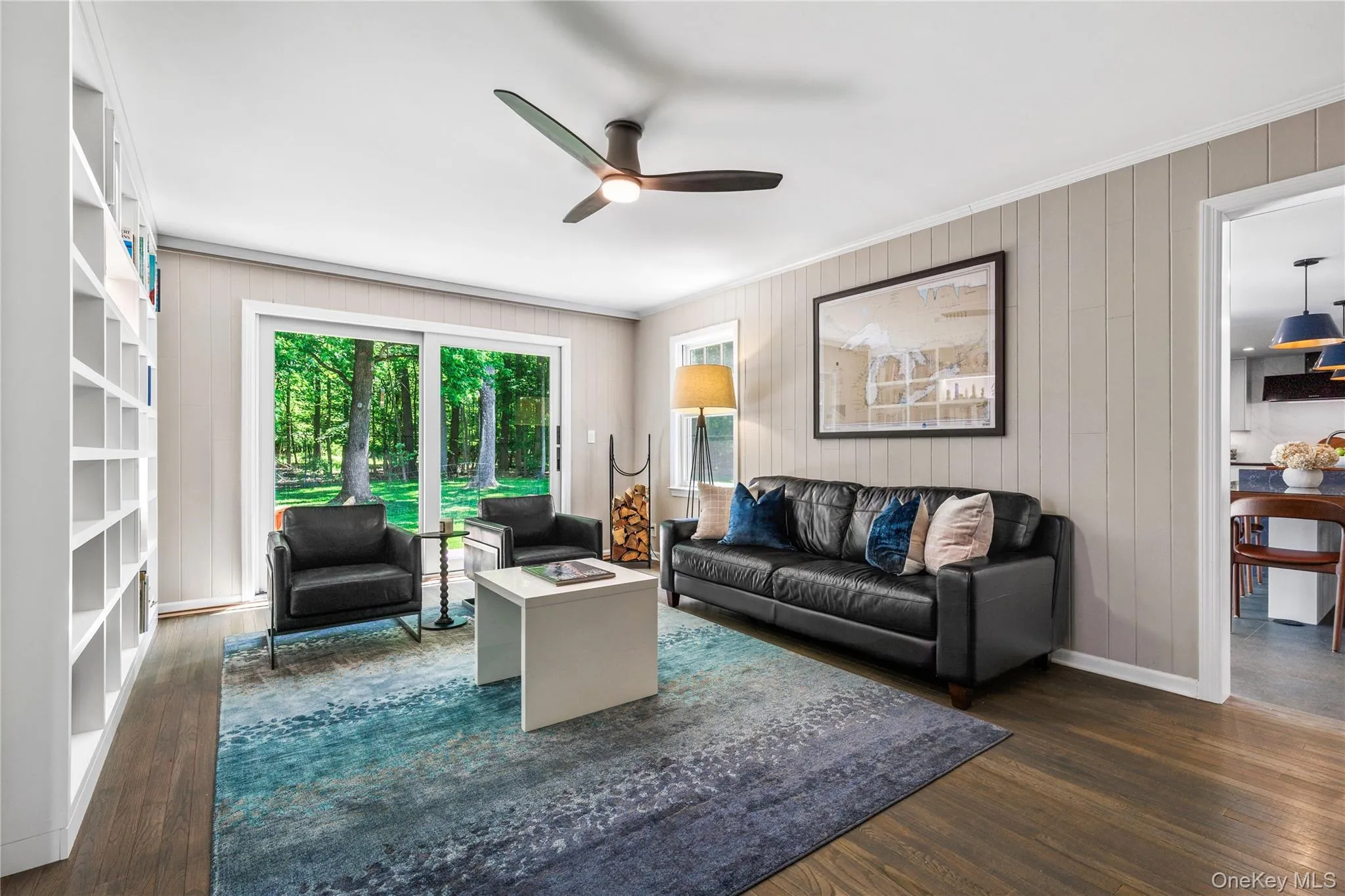 The family room opens to the deck and enjoys park-like views. The family room opens to the deck and enjoys park-like views.