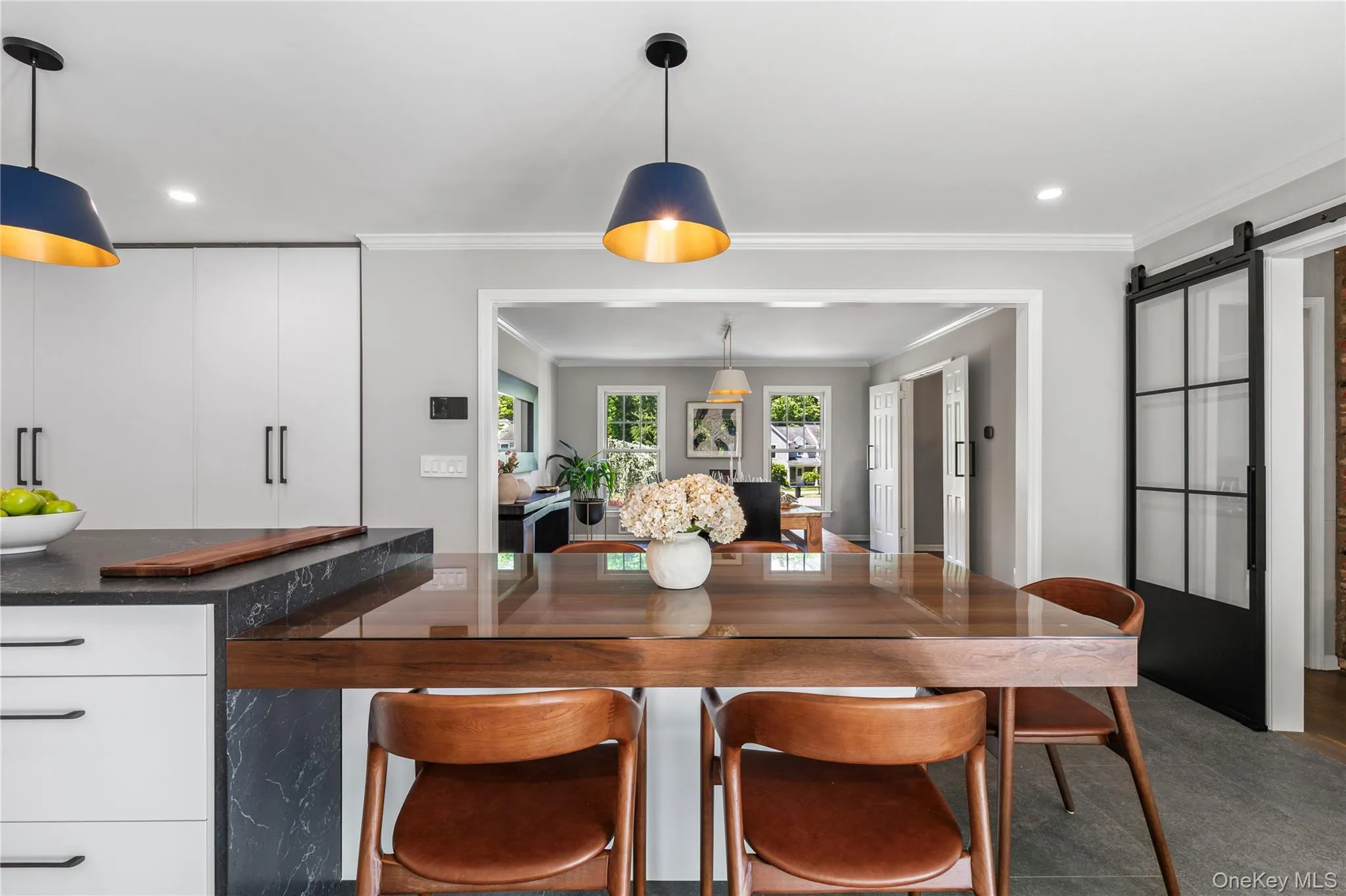During festive occasions, there is a dine-in extension off the kitchen island for additonal seating. During festive occasions, there is a dine-in extension off the kitchen island for additonal seating.