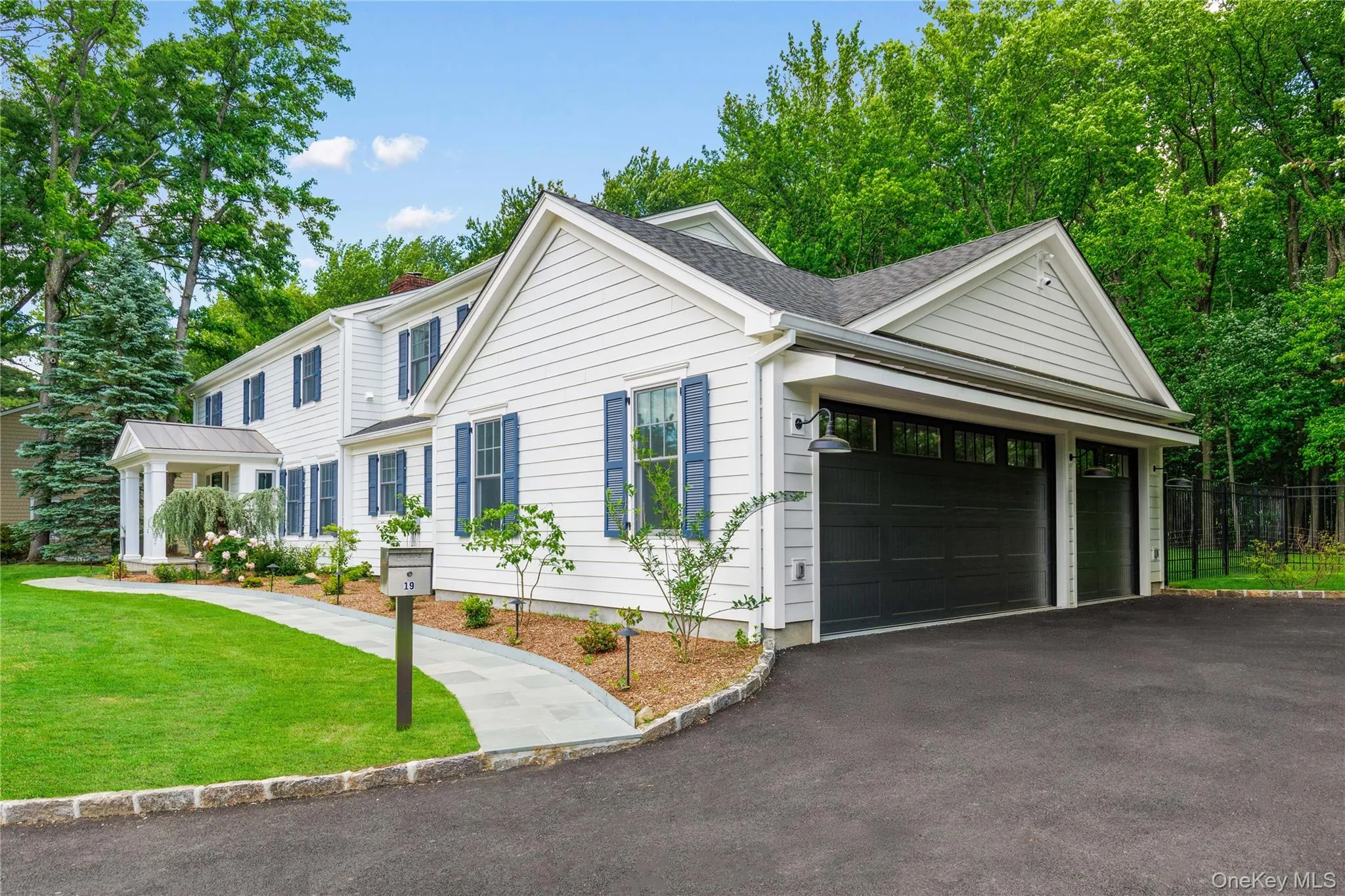 An impressive 3-car garage with an epoxy floor and two automated doors offers plenty of space for vehicles of all types. An impressive 3-car garage with an epoxy floor and two automated doors offers plenty of space for vehicles of all types.