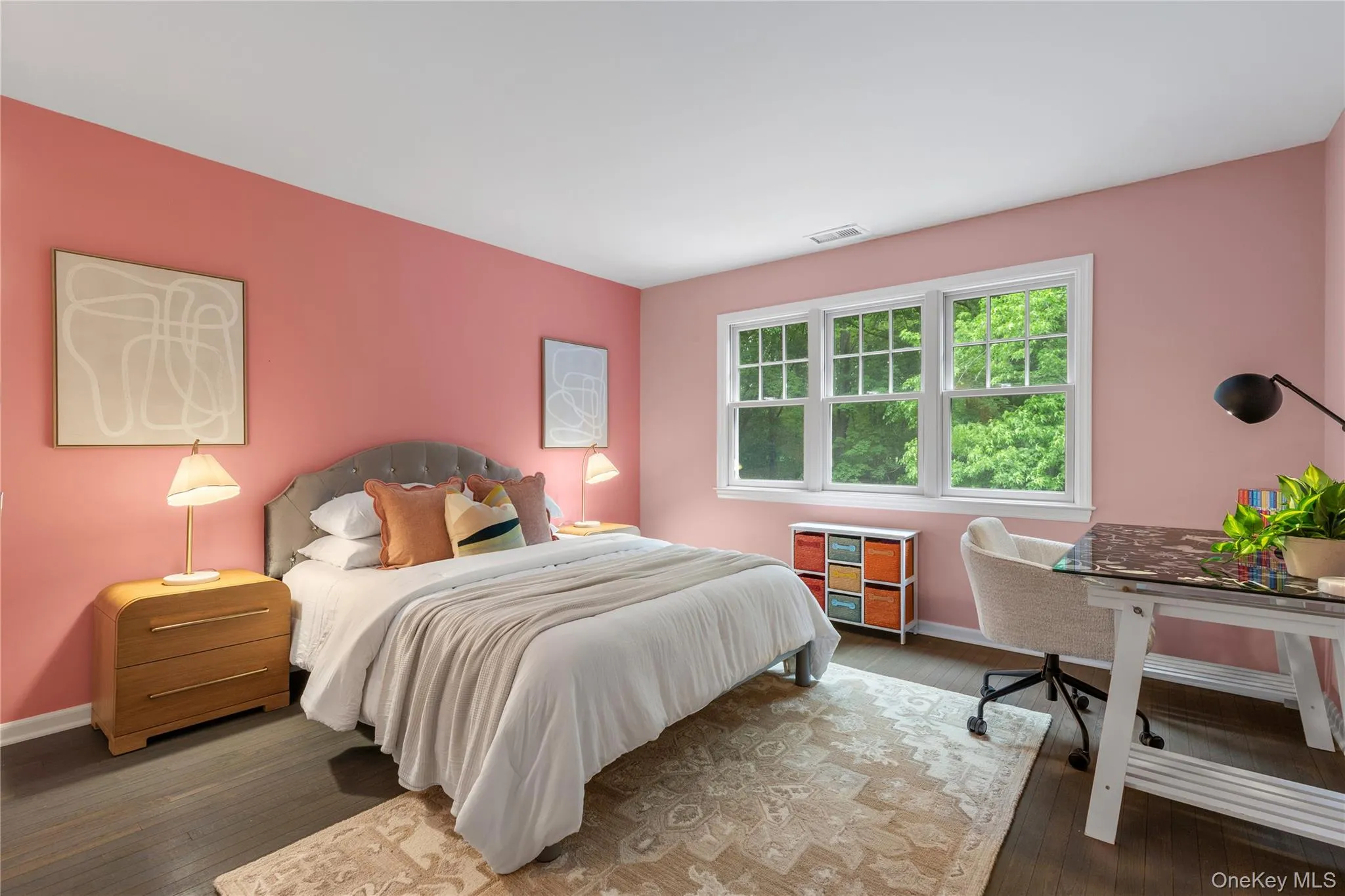 This bedroom enjoys three windows with bucolic views to the property and the nature sanctuary. This bedroom enjoys three windows with bucolic views to the property and the nature sanctuary.