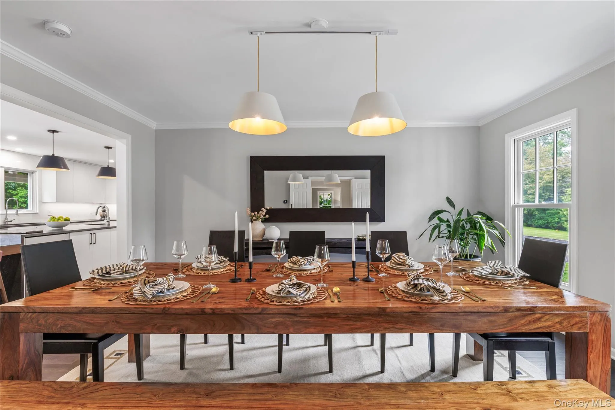 The spacious dining room host large gatherings with ease and elegance. The spacious dining room host large gatherings with ease and elegance.