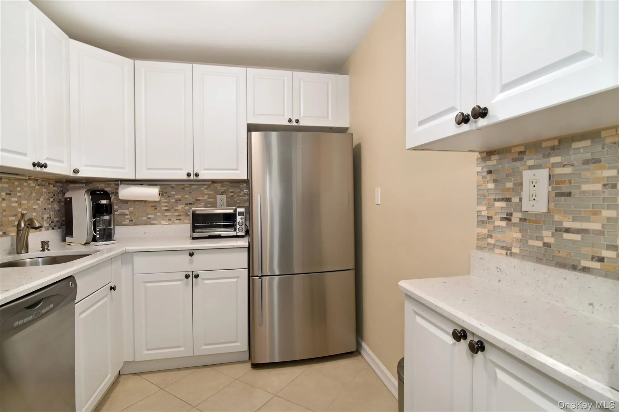 Lovely Renovated White Kitchen with Silestone Countertops Lovely Renovated White Kitchen with Silestone Countertops