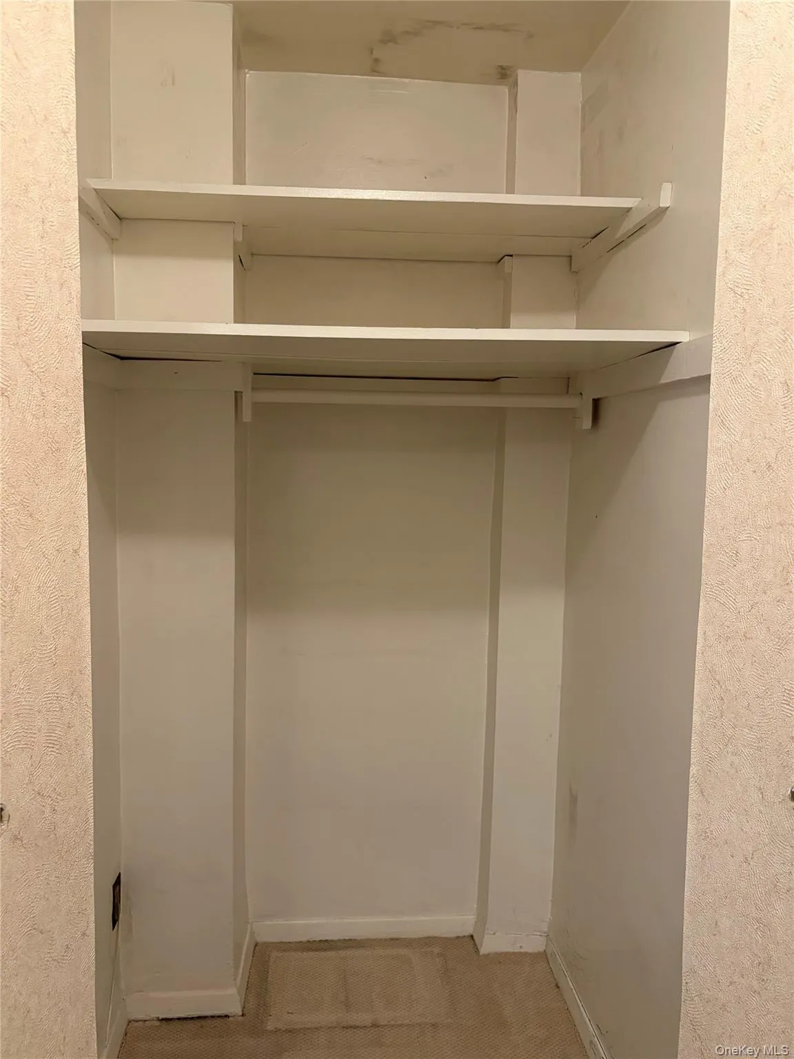 Enormous Closet with a Separate Dressing Area by the Bathroom Enormous Closet with a Separate Dressing Area by the Bathroom