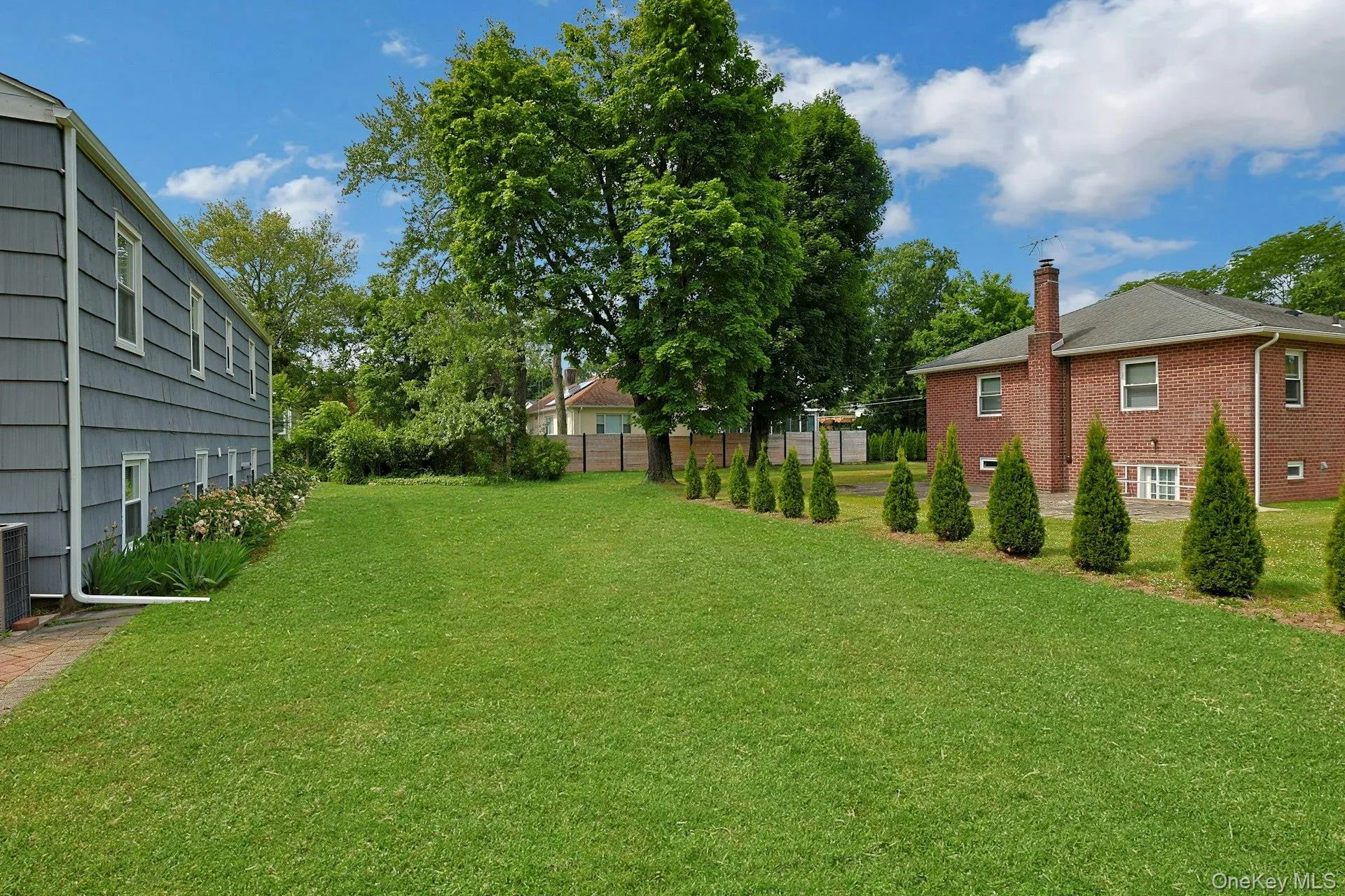 backyard is level and perfect for summer sports backyard is level and perfect for summer sports