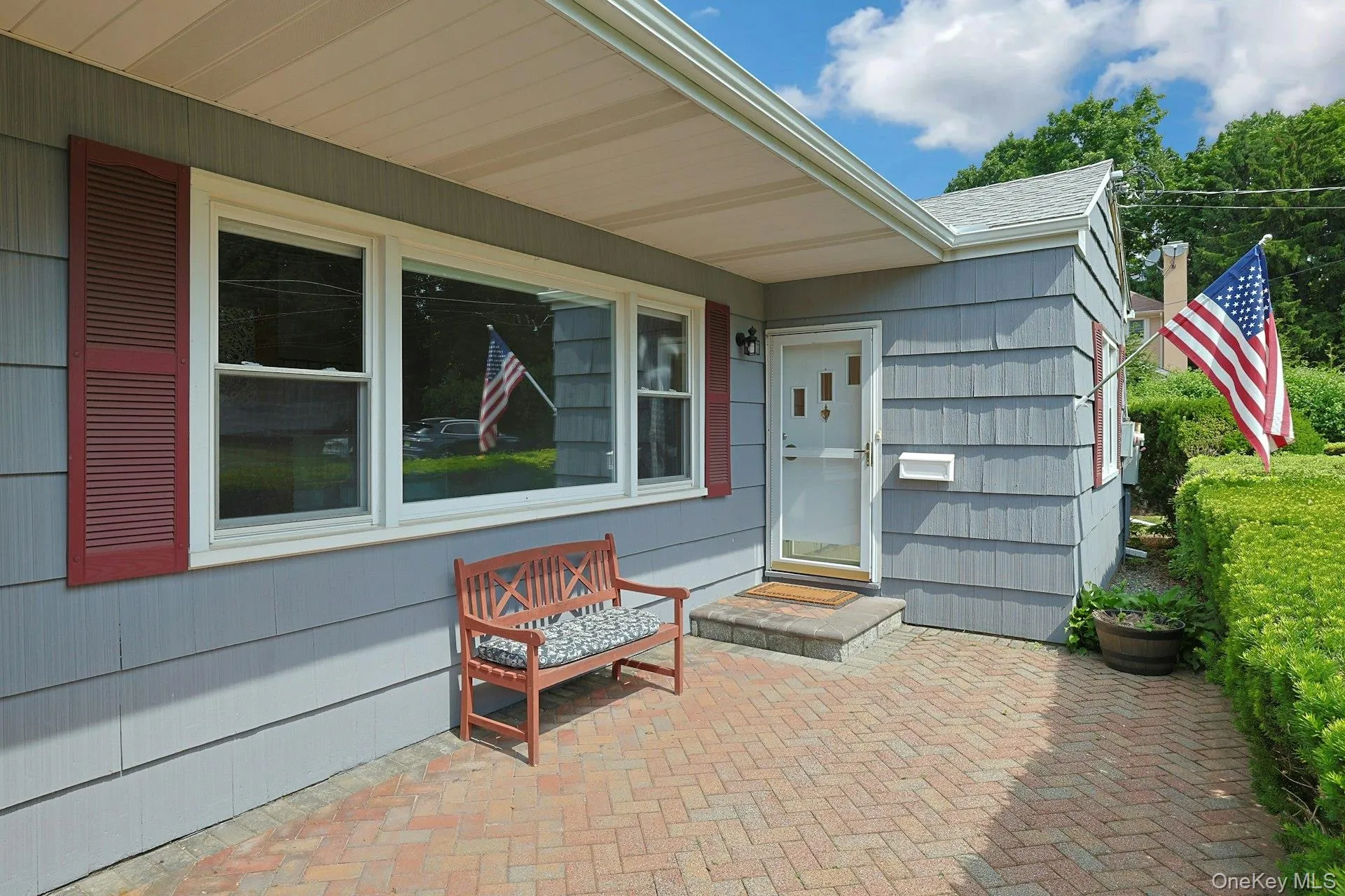 Enter through the front door or sit and relax on your patio Enter through the front door or sit and relax on your patio