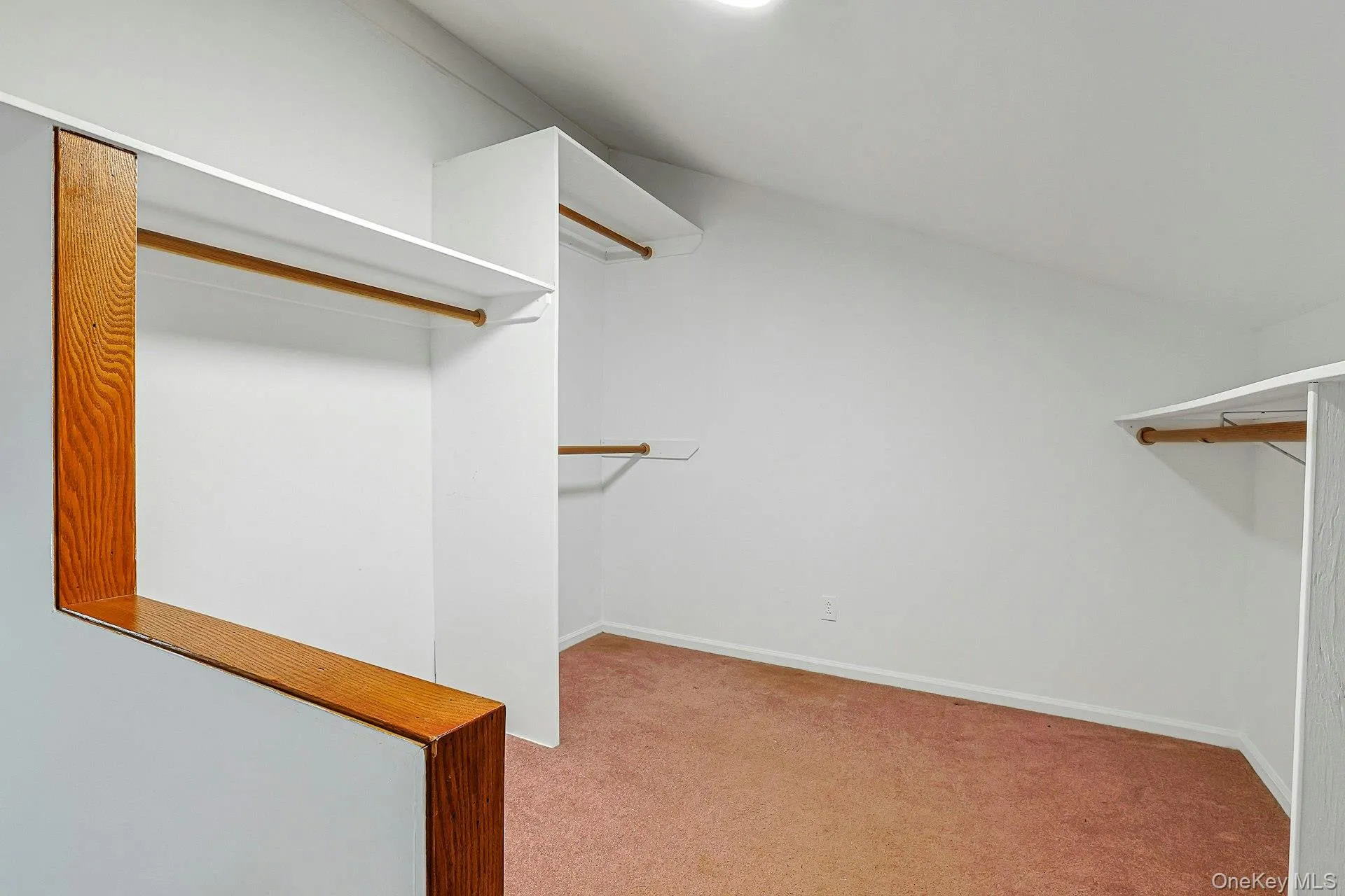 Oversized walk-in closet and/or dressing room directly accessed from primary bedroom Oversized walk-in closet and/or dressing room directly accessed from primary bedroom