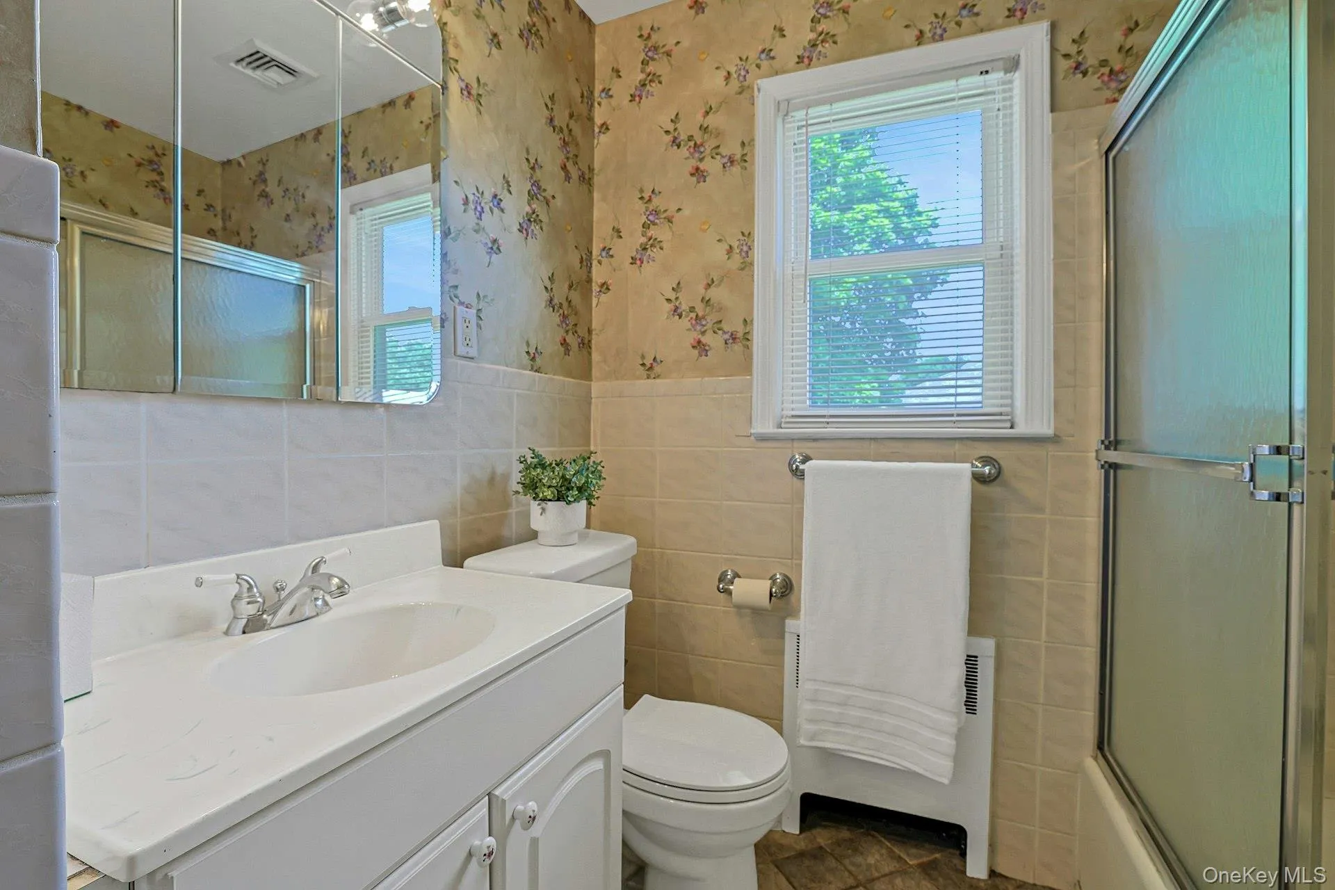 Hall bathroom with tub and shower Hall bathroom with tub and shower
