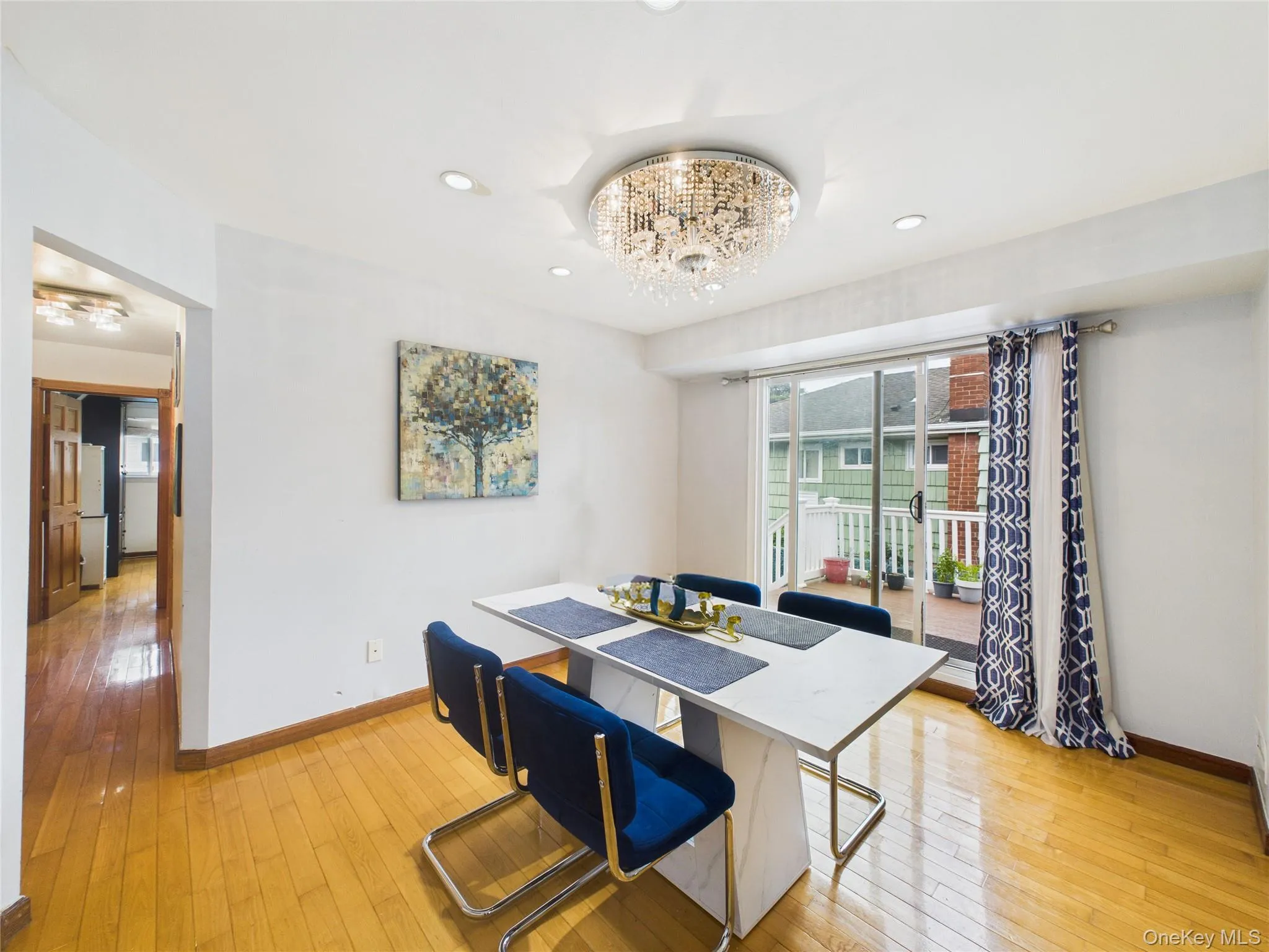Dining area featuring baseboards, light wood-type flooring, and recessed lighting Dining area featuring baseboards, light wood-type flooring, and recessed lighting