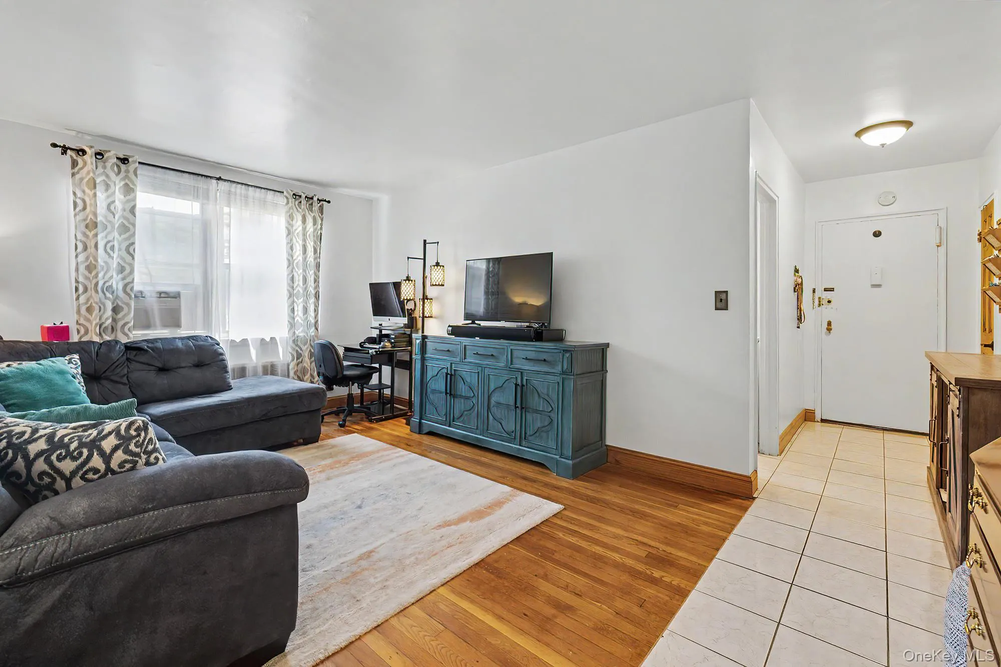 Living room and entryway. Living room and entryway.