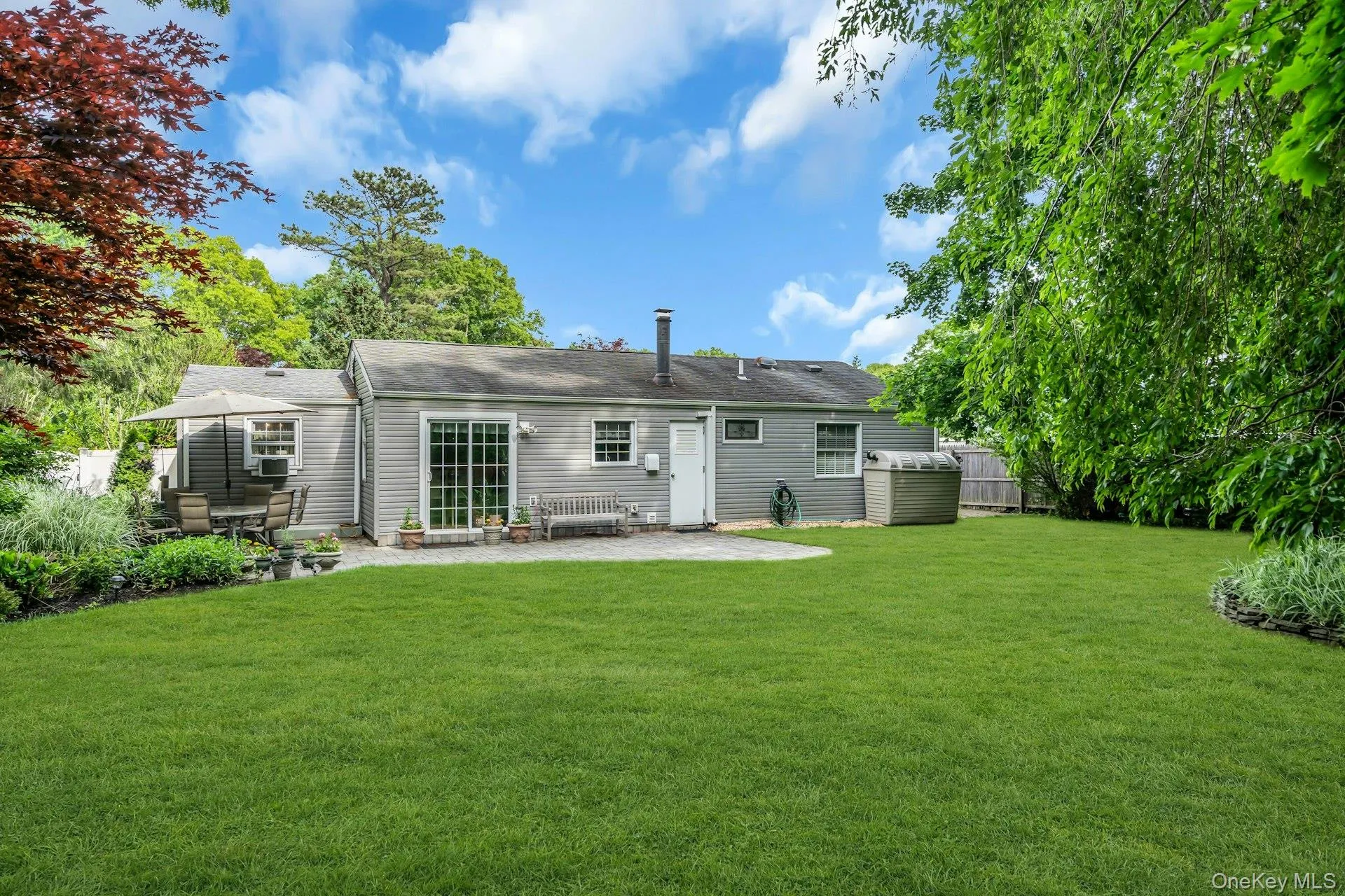 Spacious Backyard With Paver Patio Spacious Backyard With Paver Patio