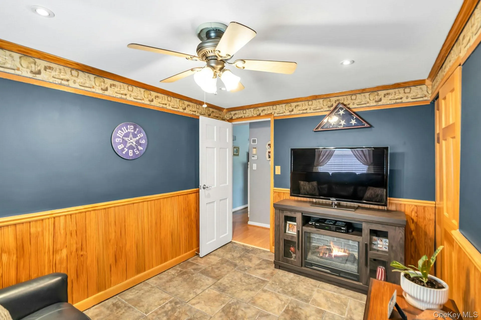 Bedroom With Ceiling Fan & Electric Fireplace Bedroom With Ceiling Fan & Electric Fireplace
