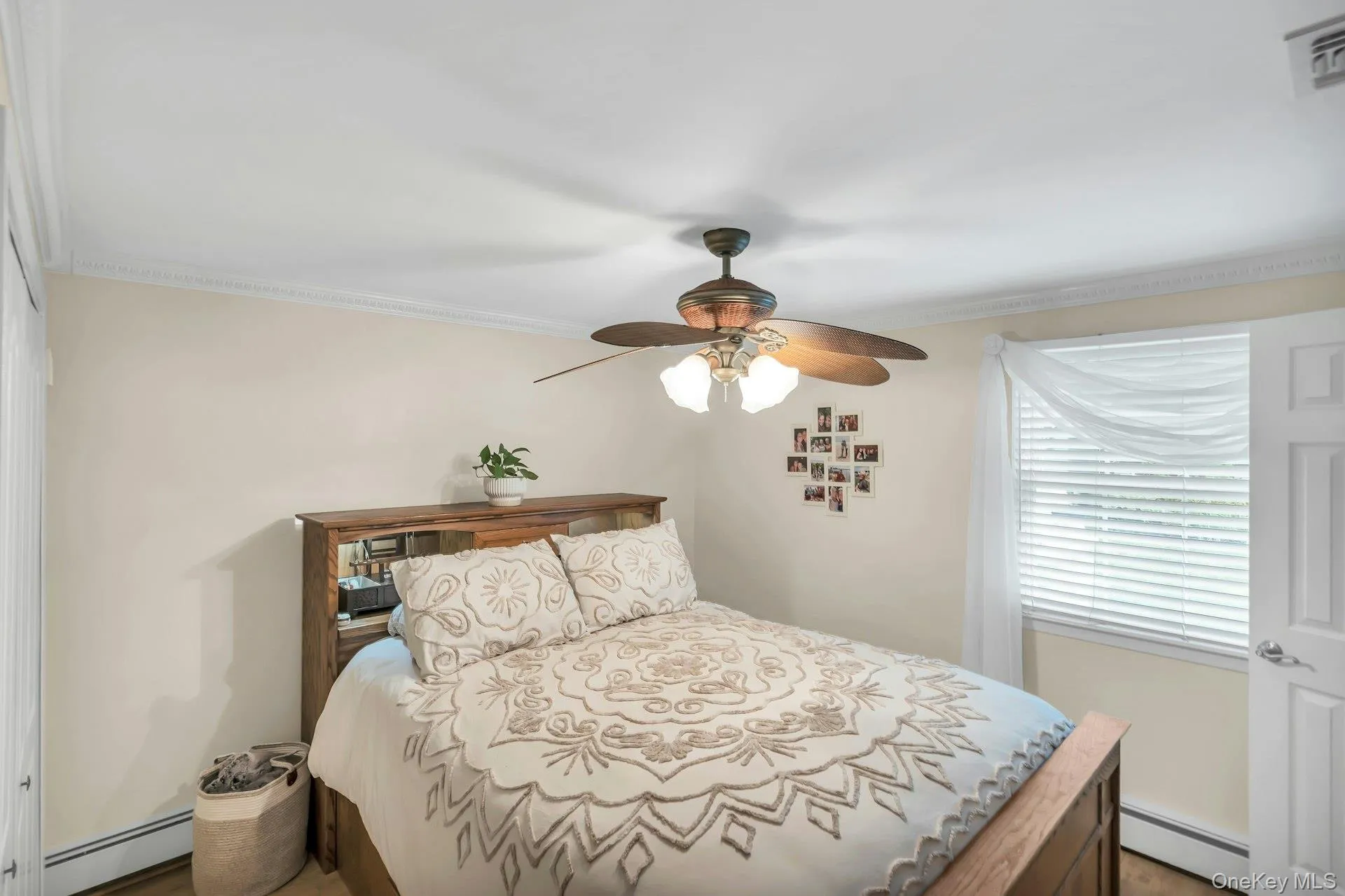 Bedroom With Crown Molding & Wood Floor Bedroom With Crown Molding & Wood Floor
