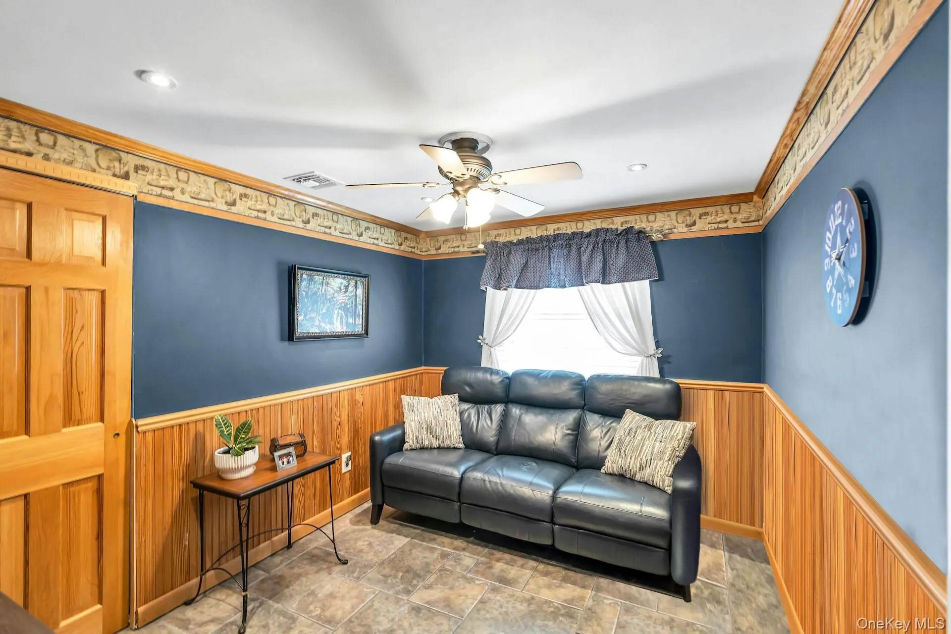 Bedroom With Wainscot, Molding & Tile Floor Bedroom With Wainscot, Molding & Tile Floor