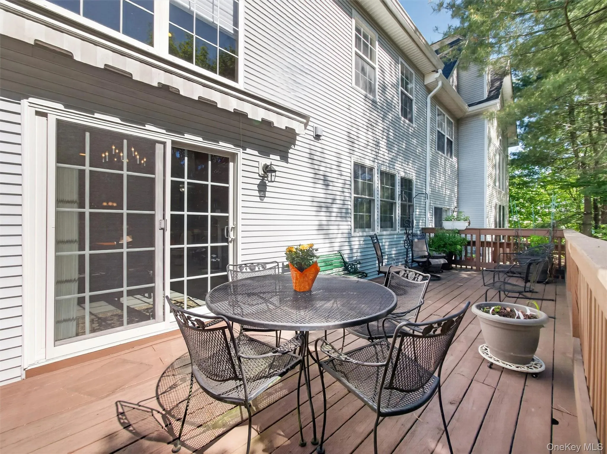 Spacious secluded deck designed for seamless entertaining. Slider leads to formal dining room. Newer remotely retractable awning. Spacious secluded deck designed for seamless entertaining. Slider leads to formal dining room. Newer remotely retractable awning.