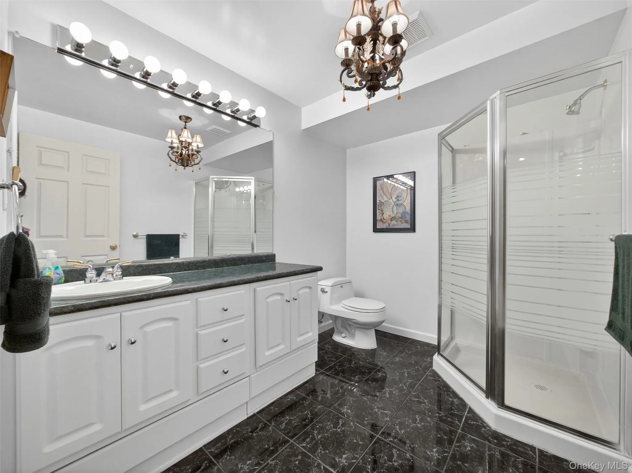 Tasteful fully finished bathroom in the basement. Tasteful fully finished bathroom in the basement.