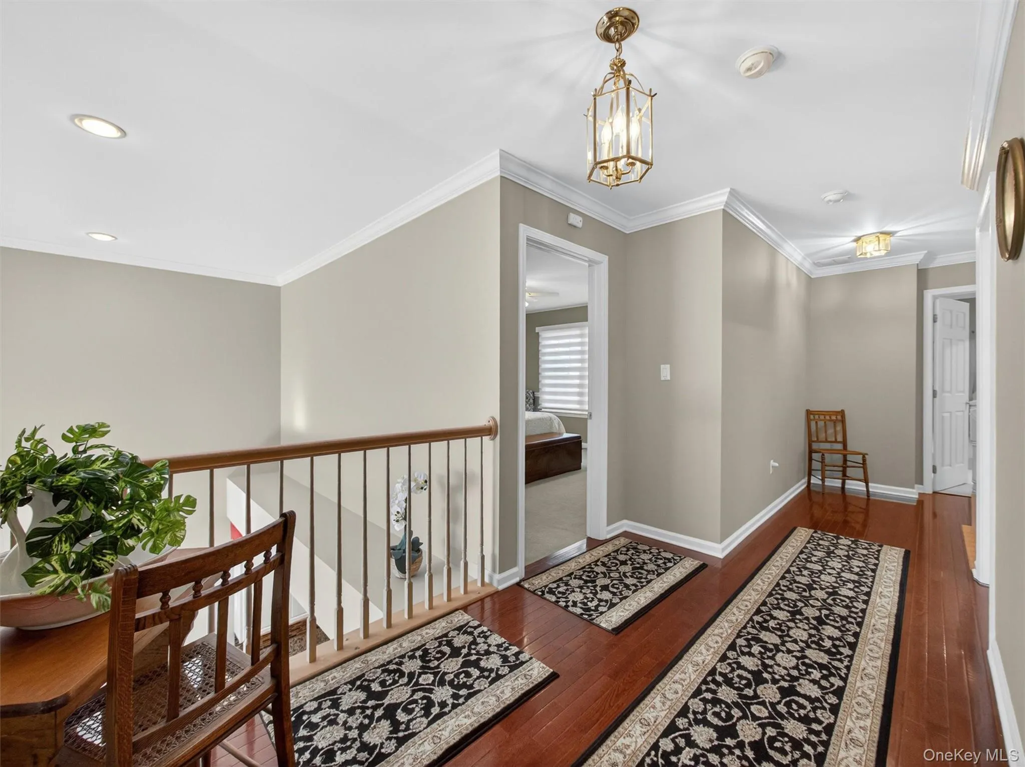 Bedroom level with overlook down to the dining room and kitchen. Bedroom level with overlook down to the dining room and kitchen.
