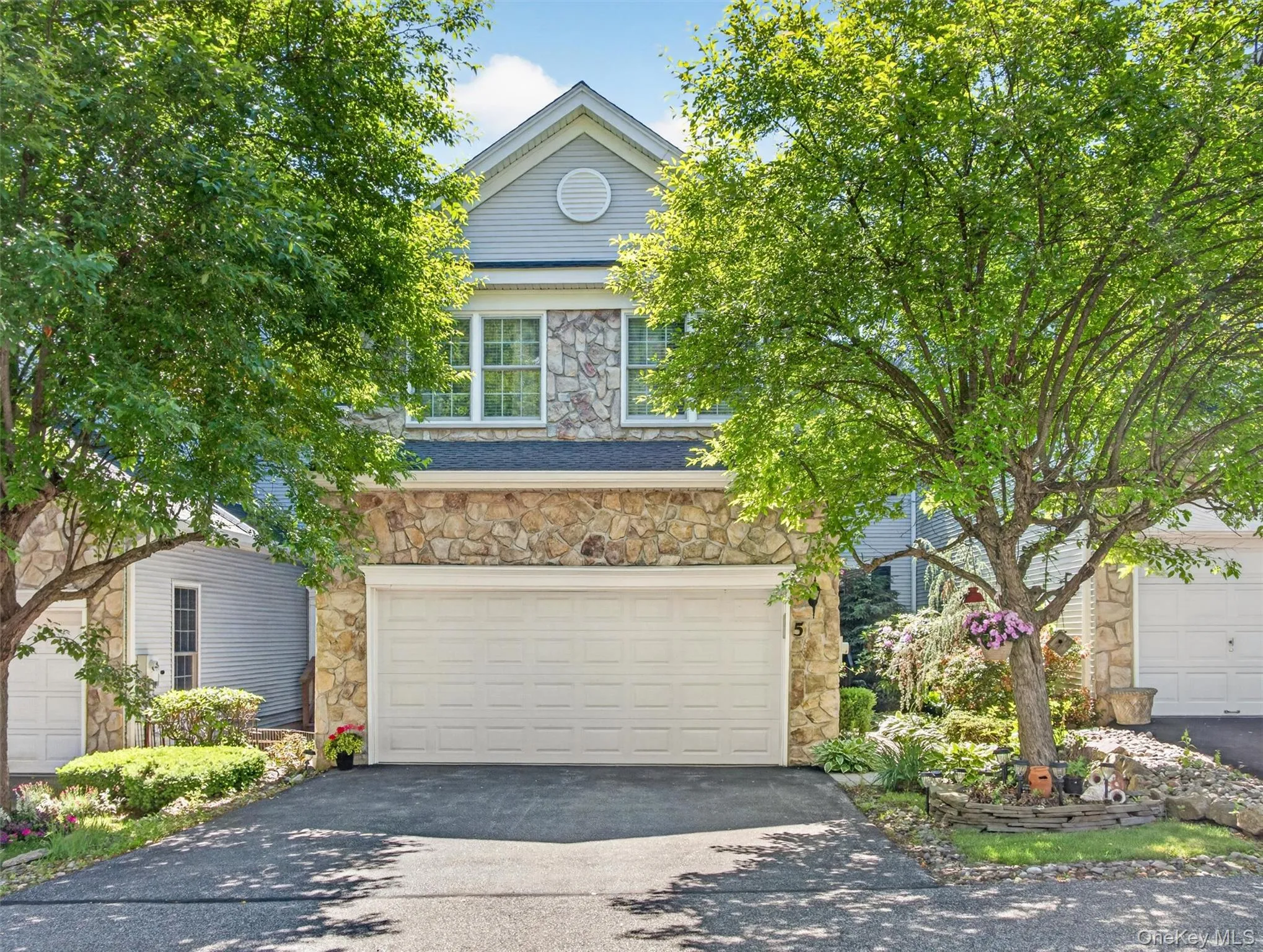 Double-wide garage, professional landscaping. Double-wide garage, professional landscaping.