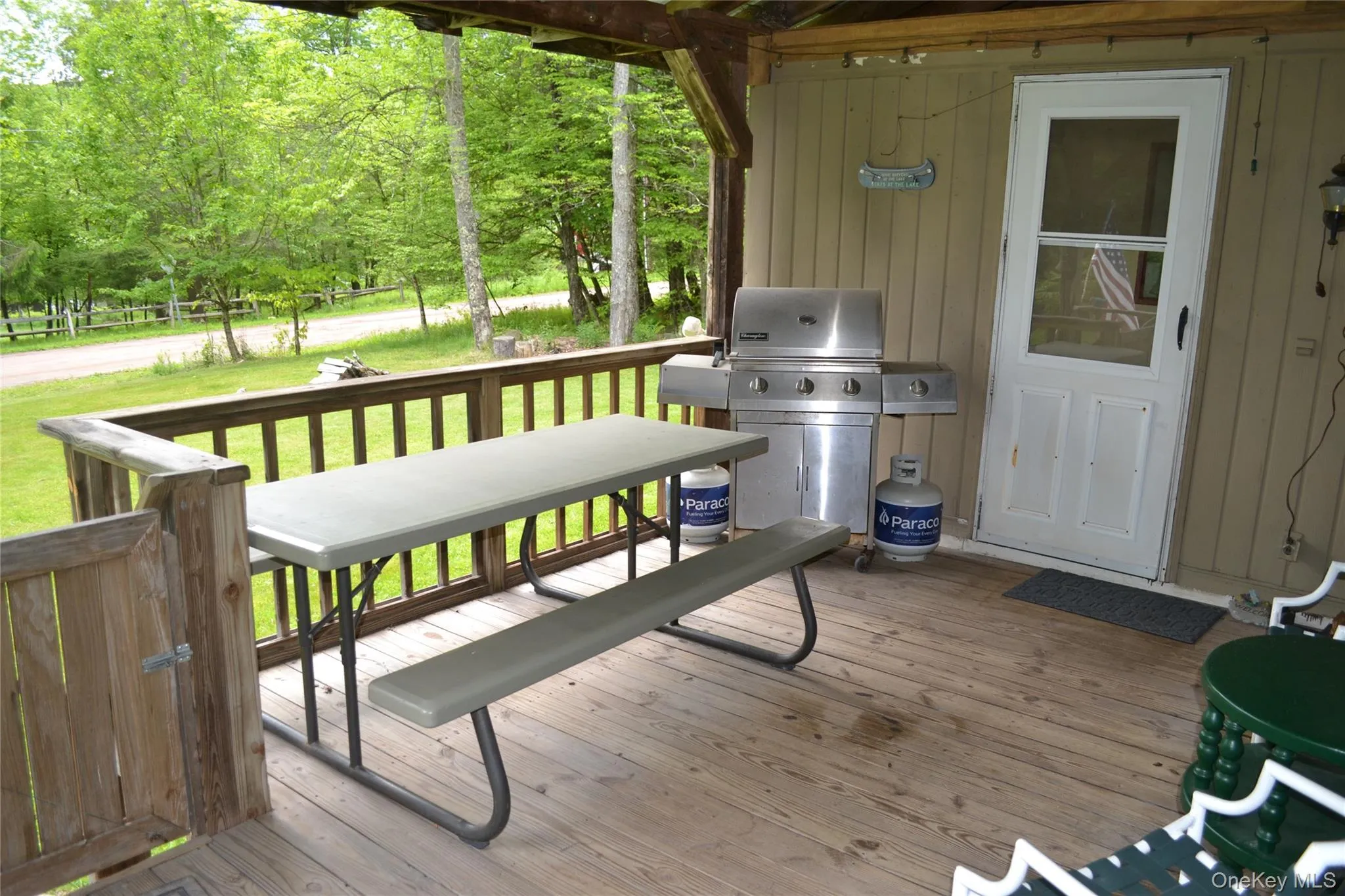 Front porch with bbq and table Front porch with bbq and table