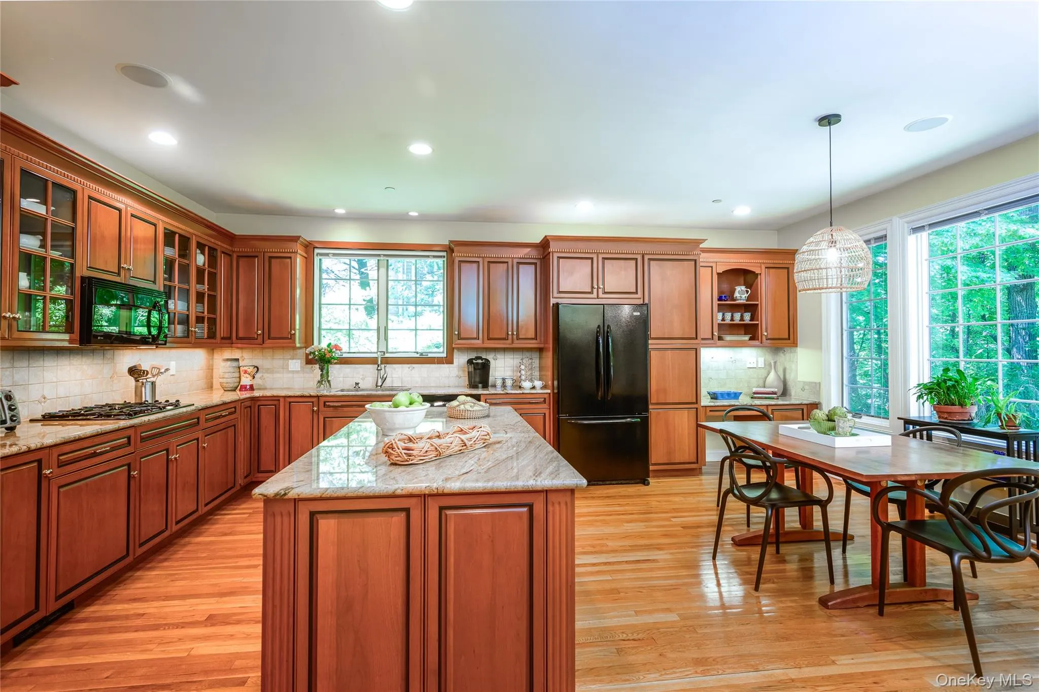 Large eat-in-kitchen with center island. Large eat-in-kitchen with center island.