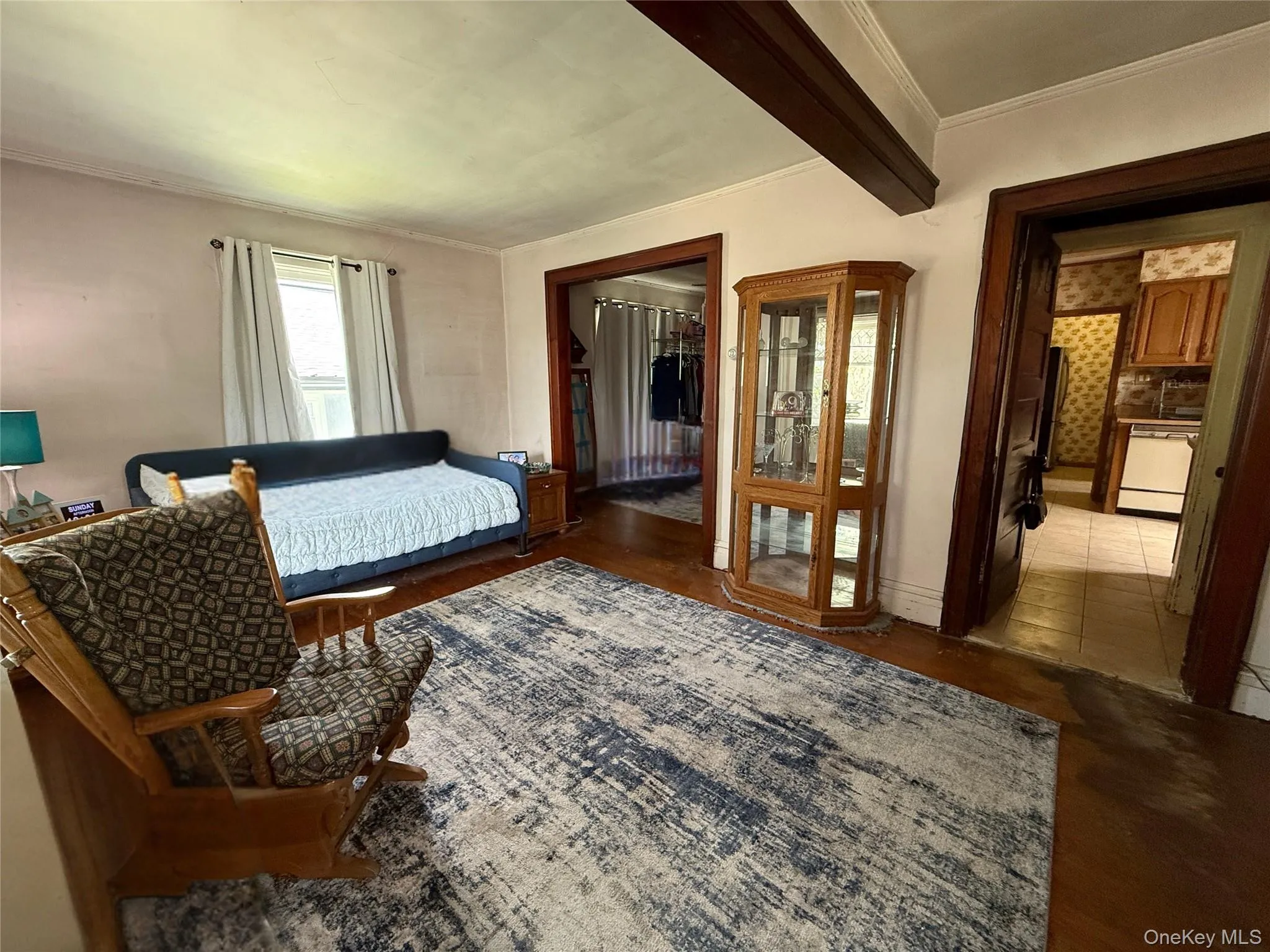 Living room with original trim and hardwood flooring Living room with original trim and hardwood flooring