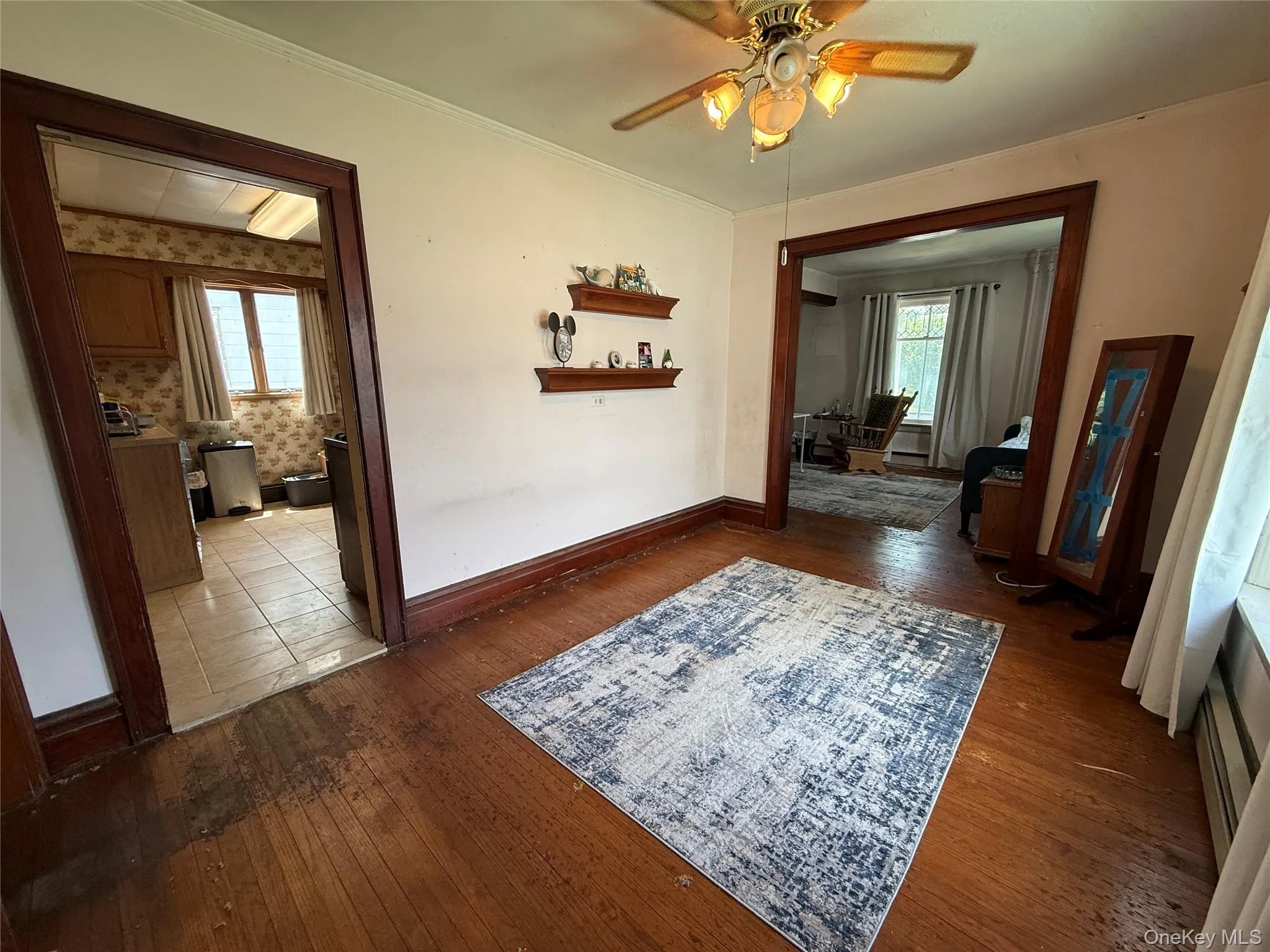 Dining room with original trim and hardwood flooring Dining room with original trim and hardwood flooring