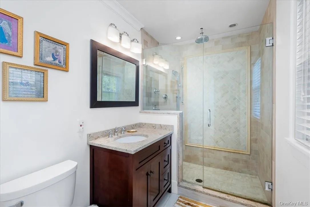 Primary Bathroom with a shower with door, oversized vanity Primary Bathroom with a shower with door, oversized vanity