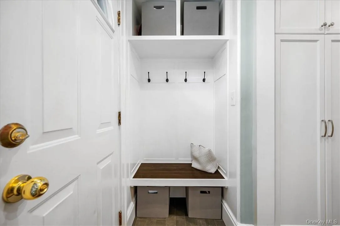 Mudroom with wood-type flooring Mudroom with wood-type flooring