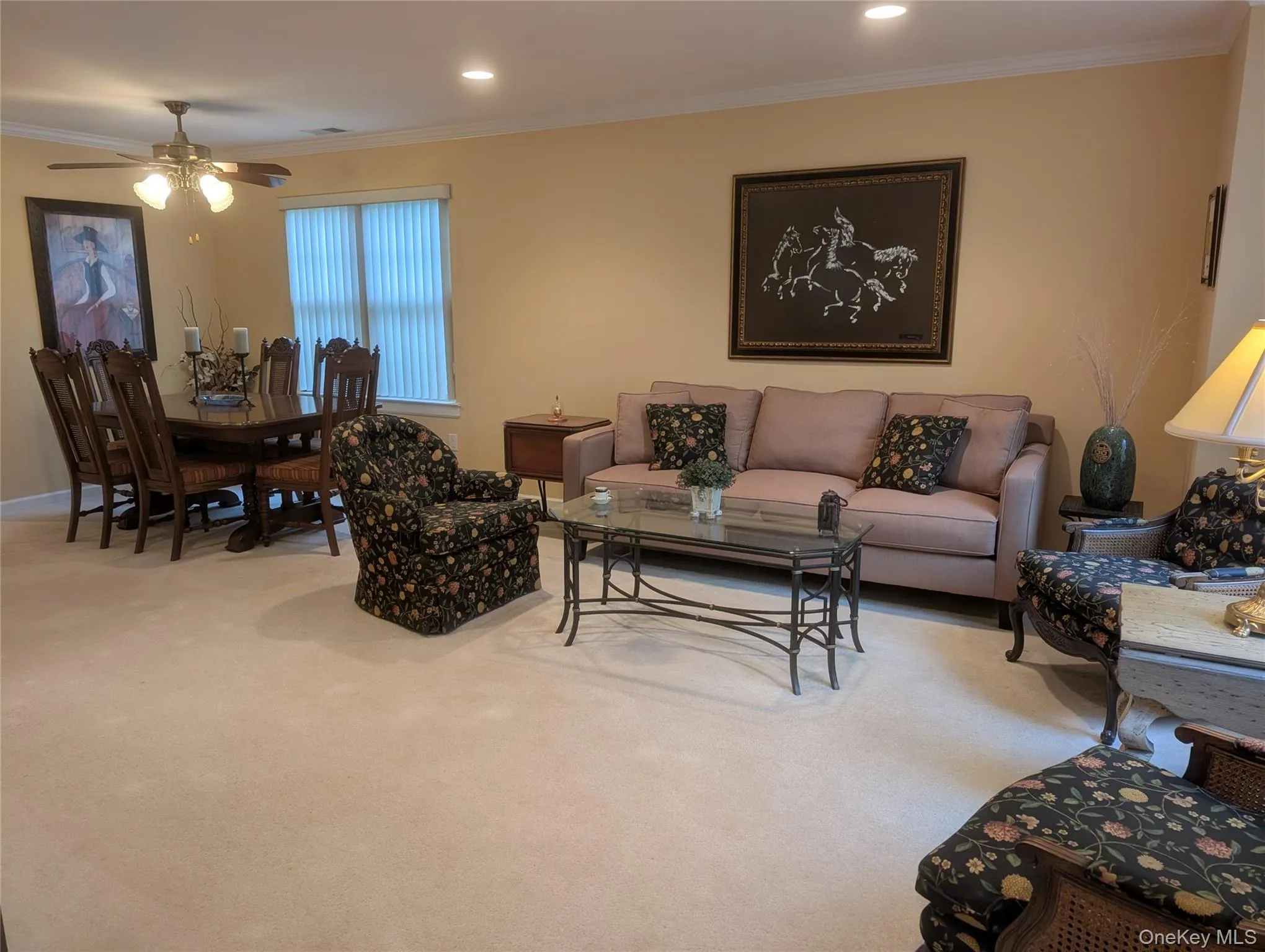 Open-concept living area and dining space Open-concept living area and dining space