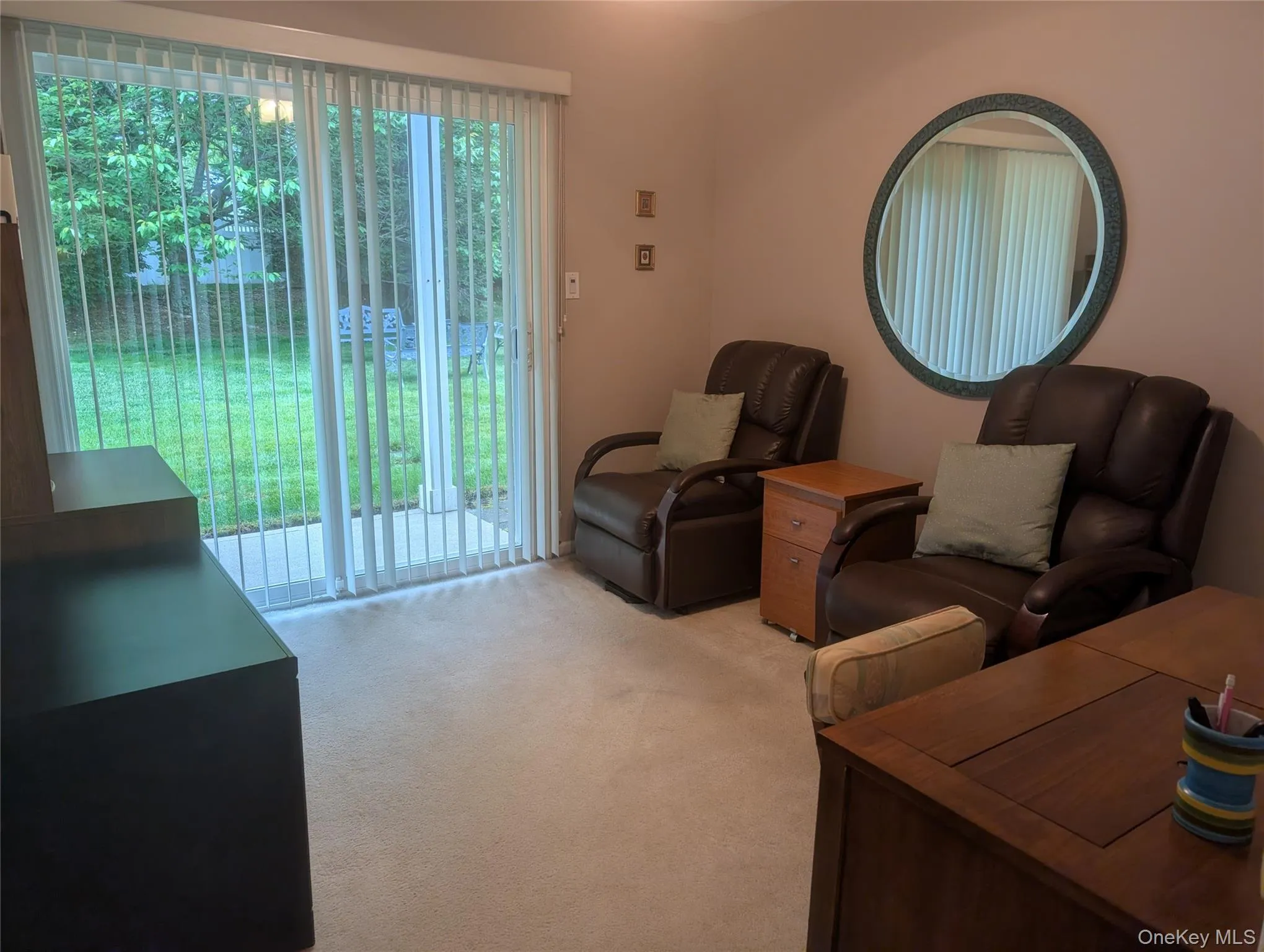 Bedroom/Den With Sliding glass patio doors opening to a private outdoor space Bedroom/Den With Sliding glass patio doors opening to a private outdoor space