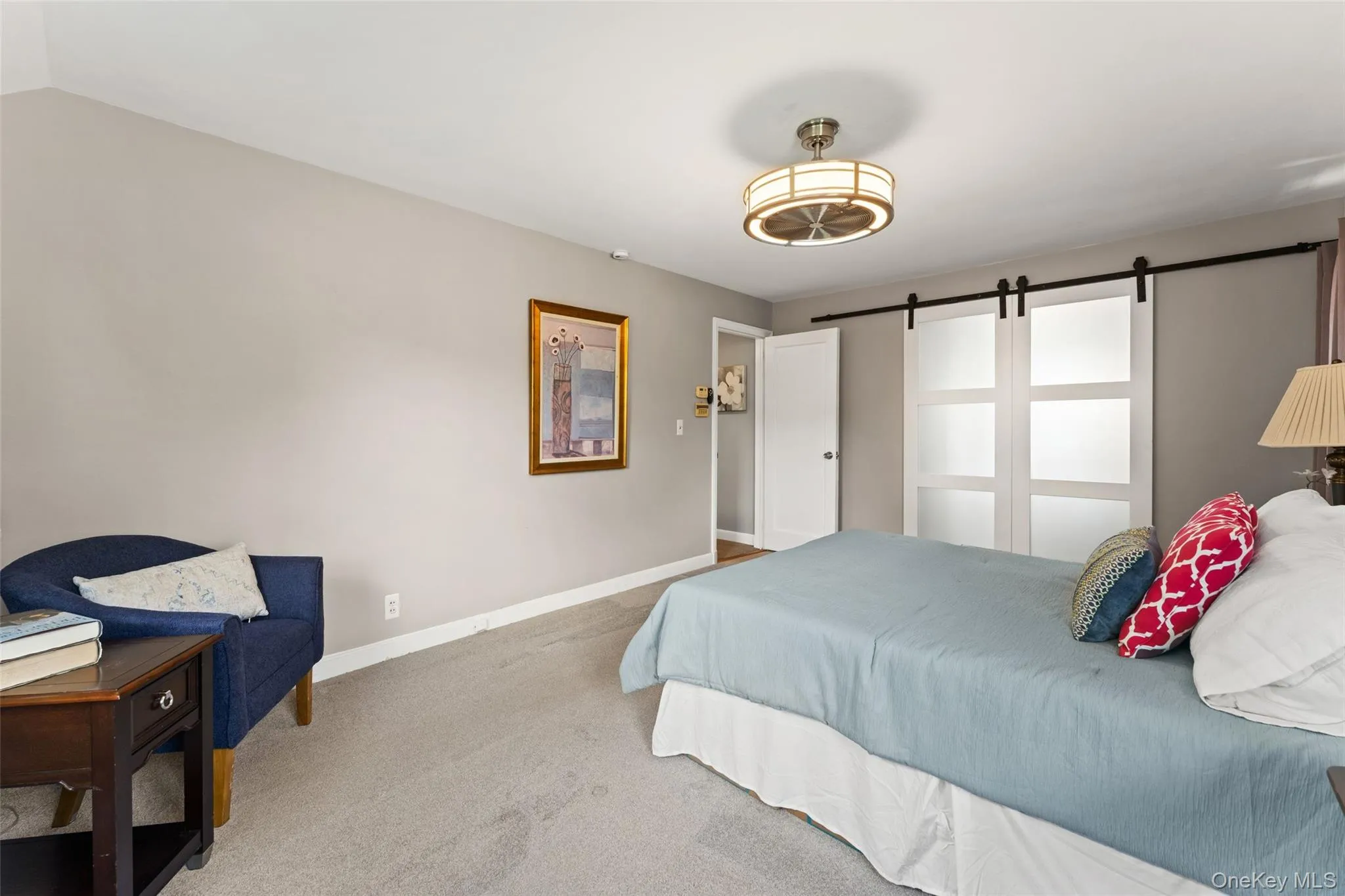 Primary bedroom with walk in closet/dressing room Primary bedroom with walk in closet/dressing room